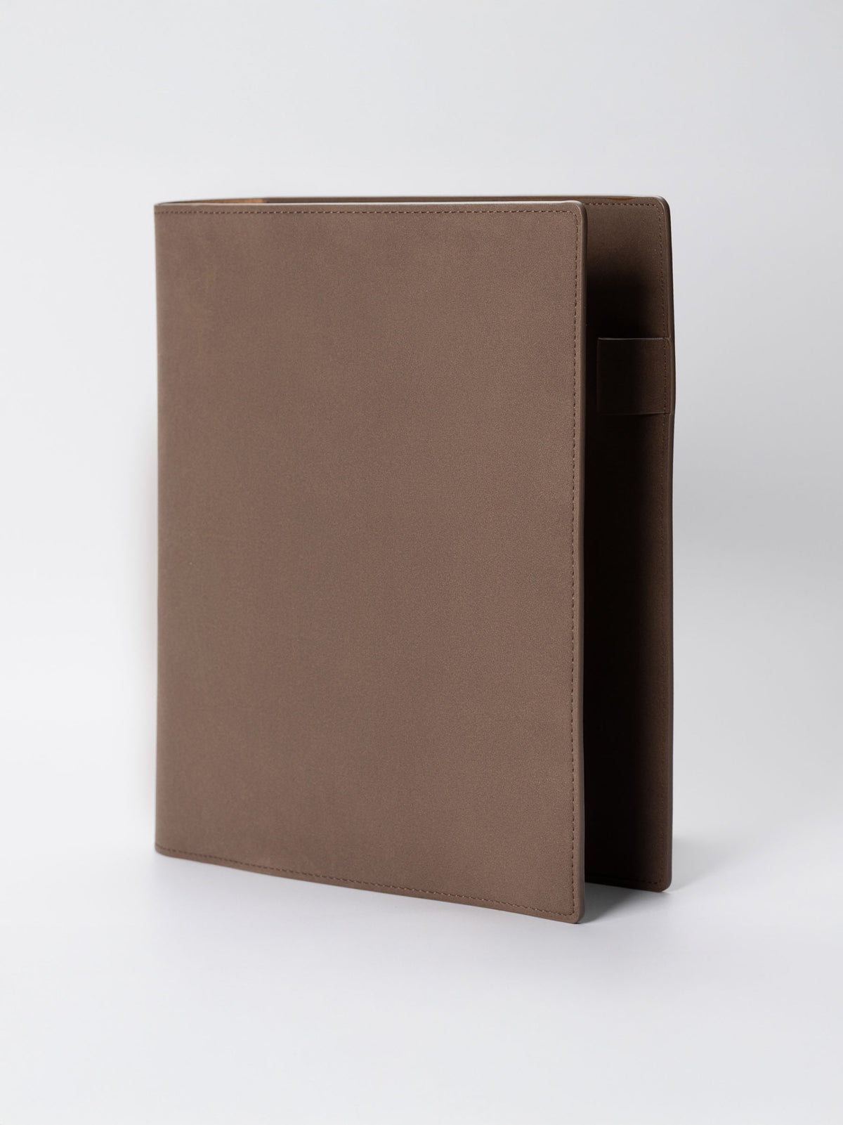Folio displayed on a neutral background. Color shown is Espresso.
