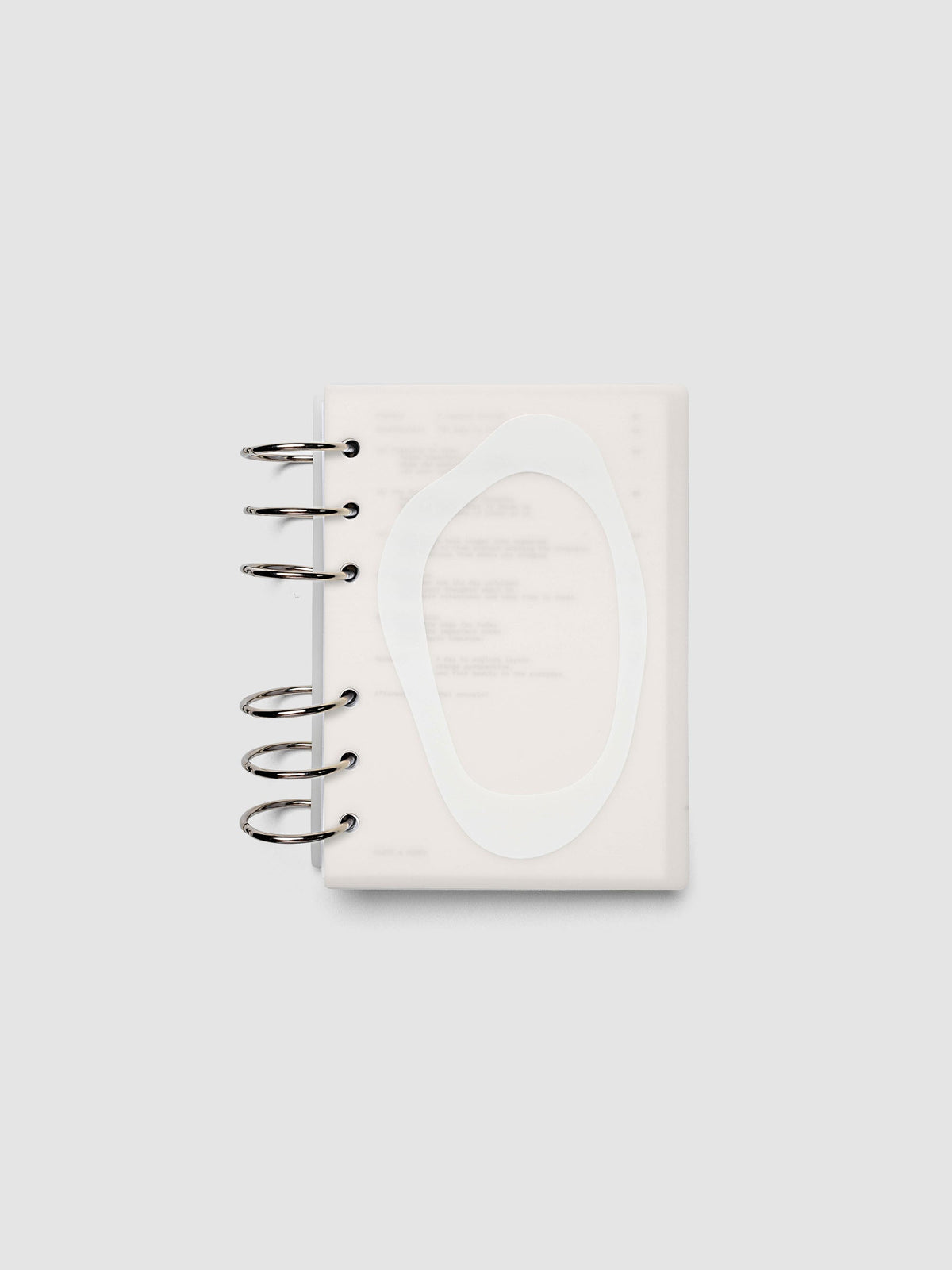 Continuation Planner Cover + Dashboard Set in A6. Milky white frosted plastic cover with a spot gloss organic shape over a black-printed paper dashboard. Image 2 of 3.