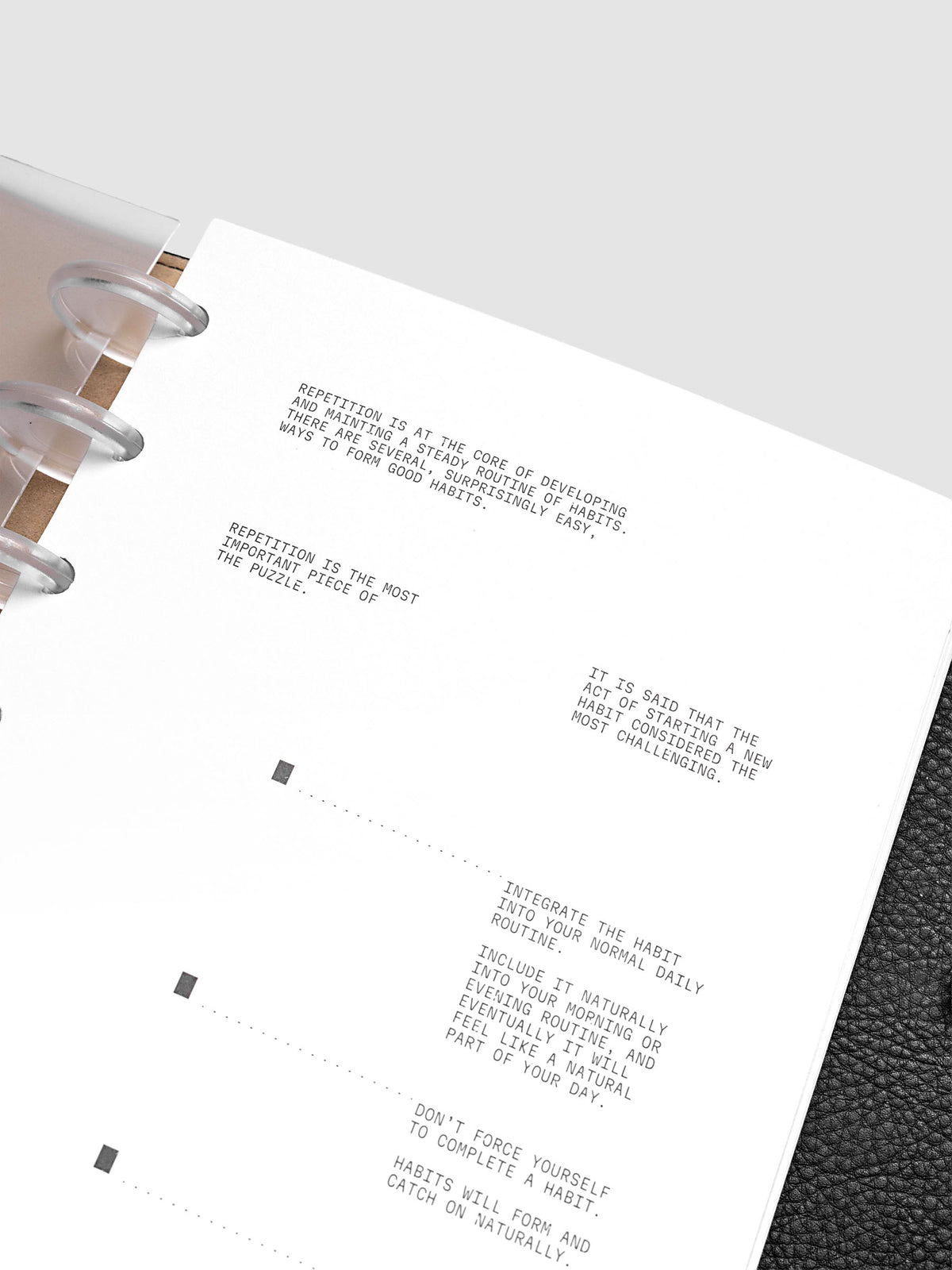 Close up view of a white paper dashboard with black printed text design.