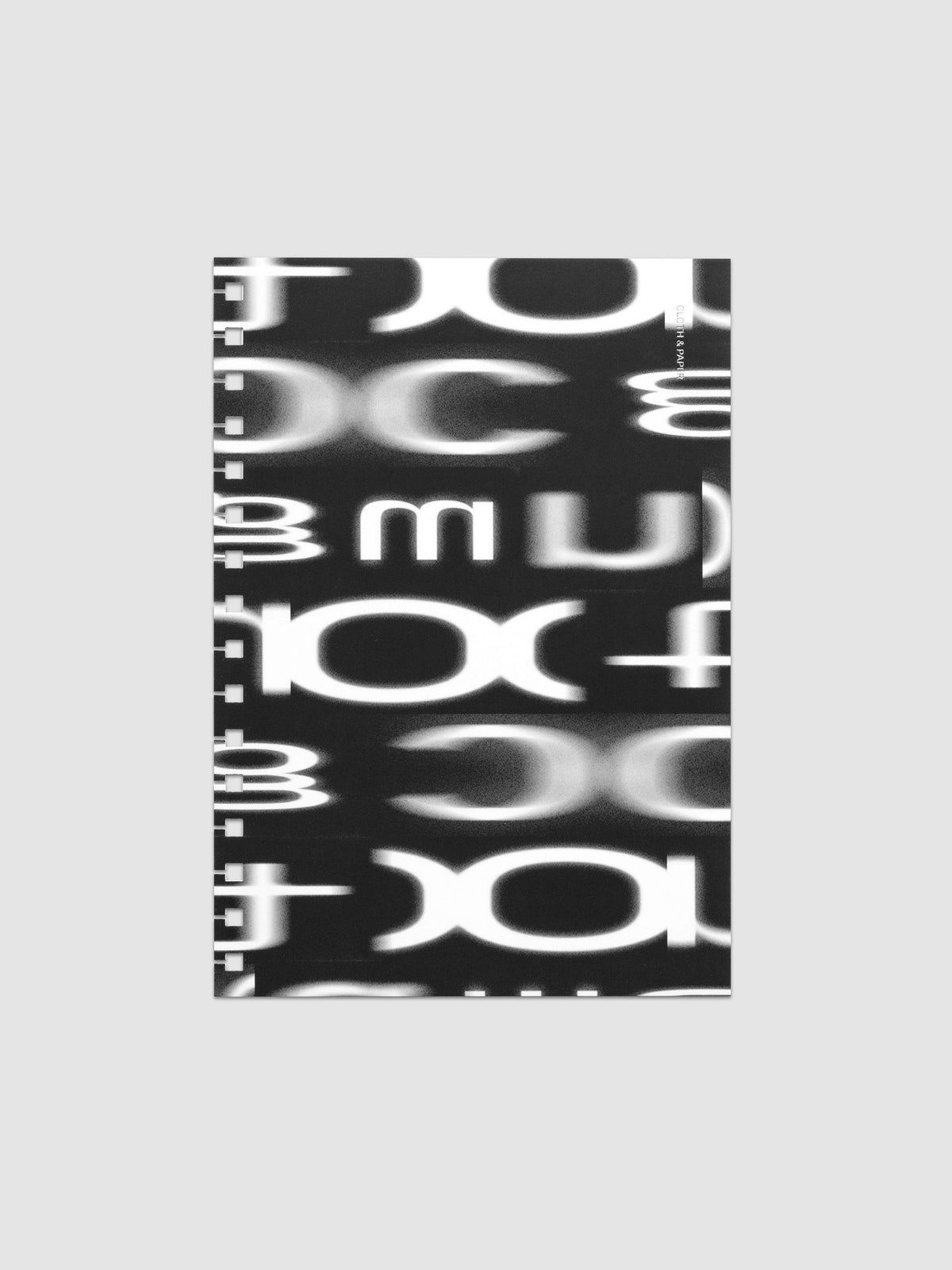 Spiral Notebook dashboard in the pattern Blurred Letters shown in size A5 against a neutral background.