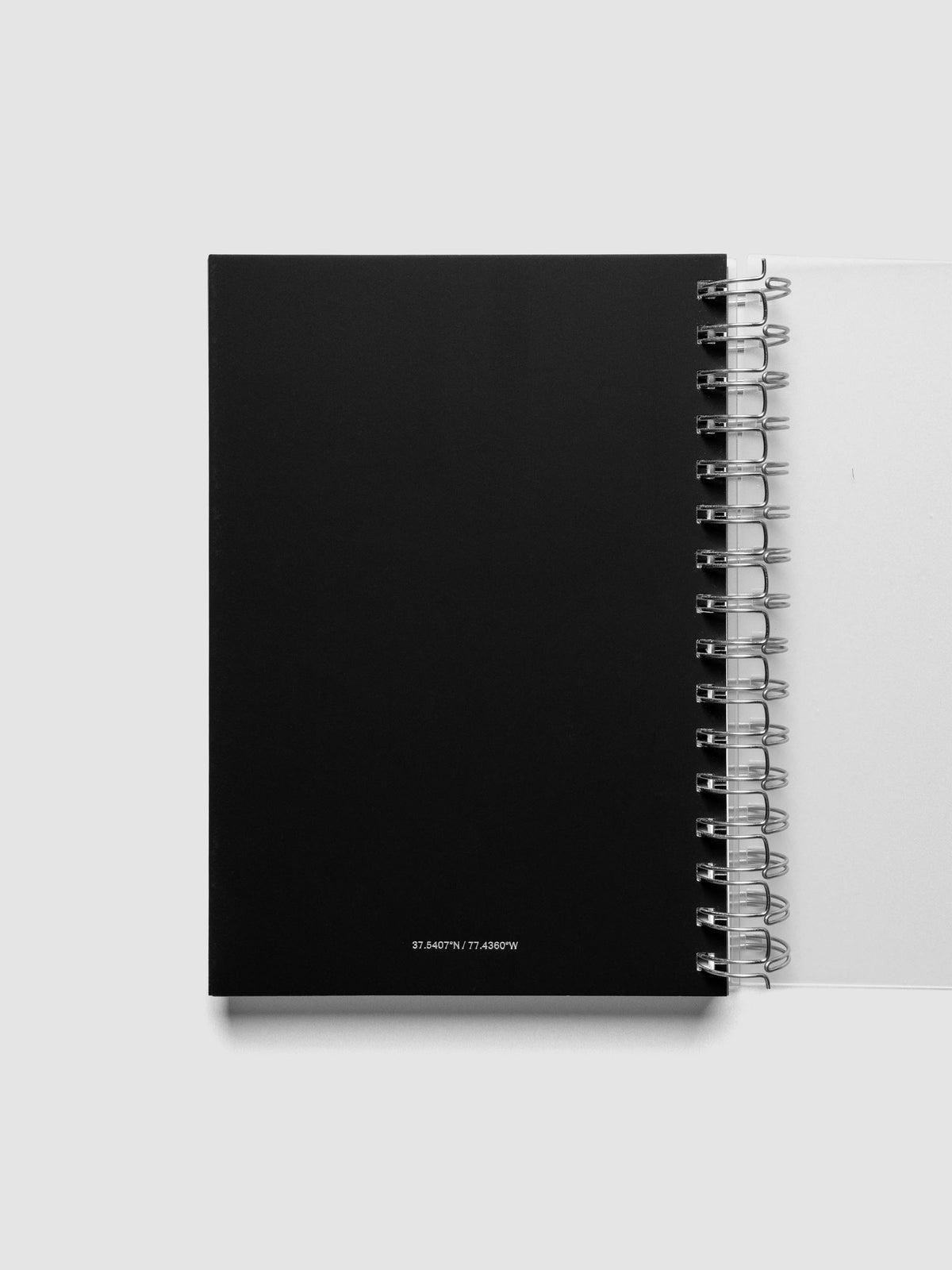Spiral Notebook dashboard in the pattern Blurred Letters shown in size A5 inside a notebook.