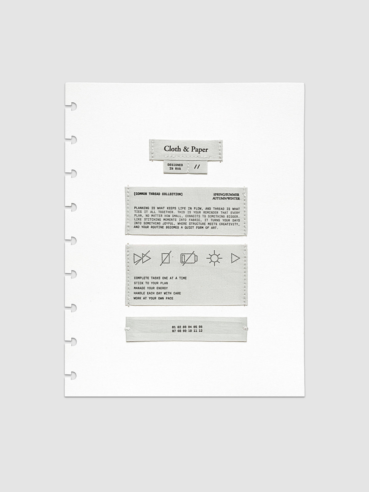 Sewn Tags Planner Dashboard shown pre-punched for discbound planners in size HP Classic.