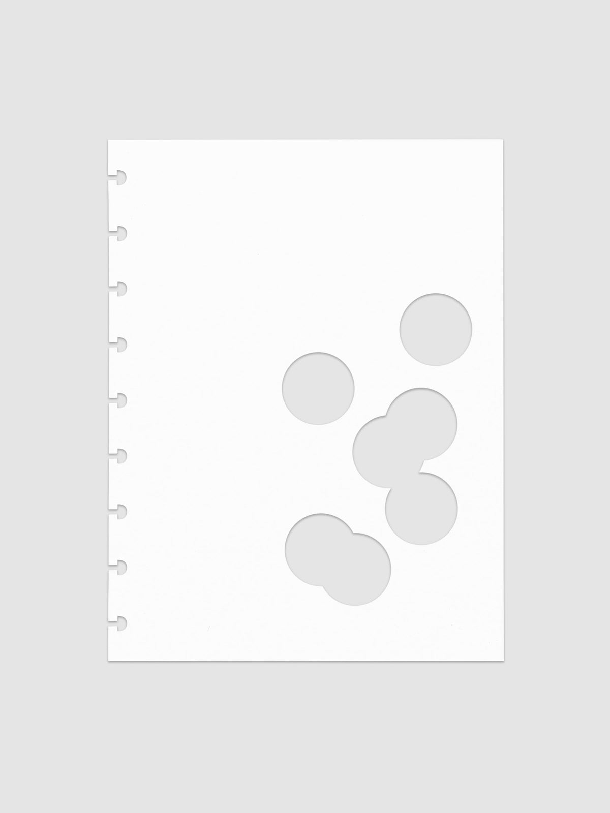 White dashboard from the Ink Blot Planner Dashboard Duo on a neutral background in size HP Classic, pre-punched for discbound planners.