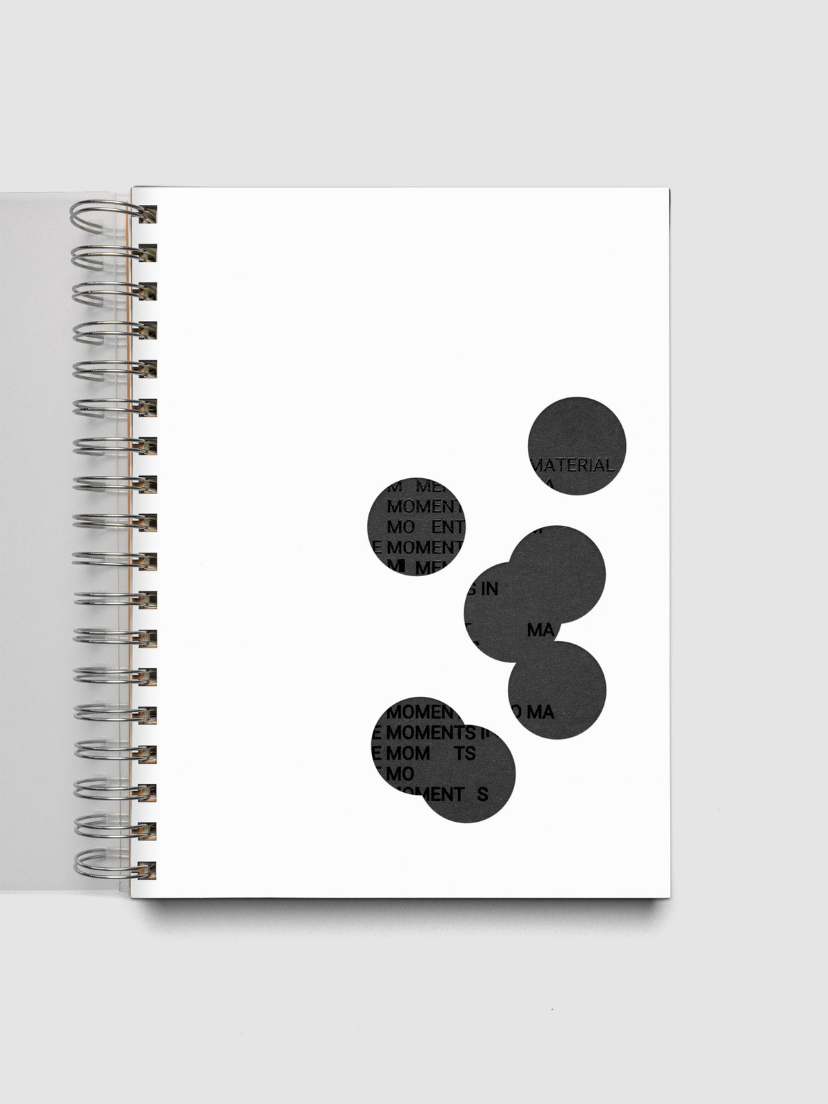 Black and white Ink Blot Planner Dashboard Duo shown layered in a spiral notebook in size HP Classic Spiral.