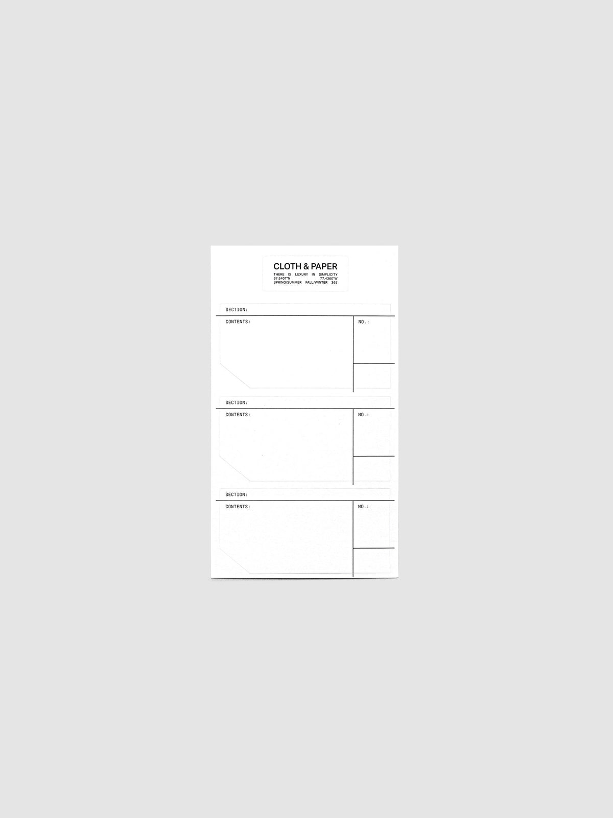 One small sheet of sticker labels with headers for section, contents, and number.
