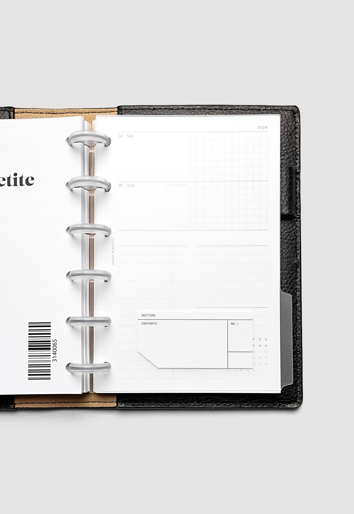 Clear side tab dividers sized for CP Petite planners shown in use with a blank label with headers section, content, and no.