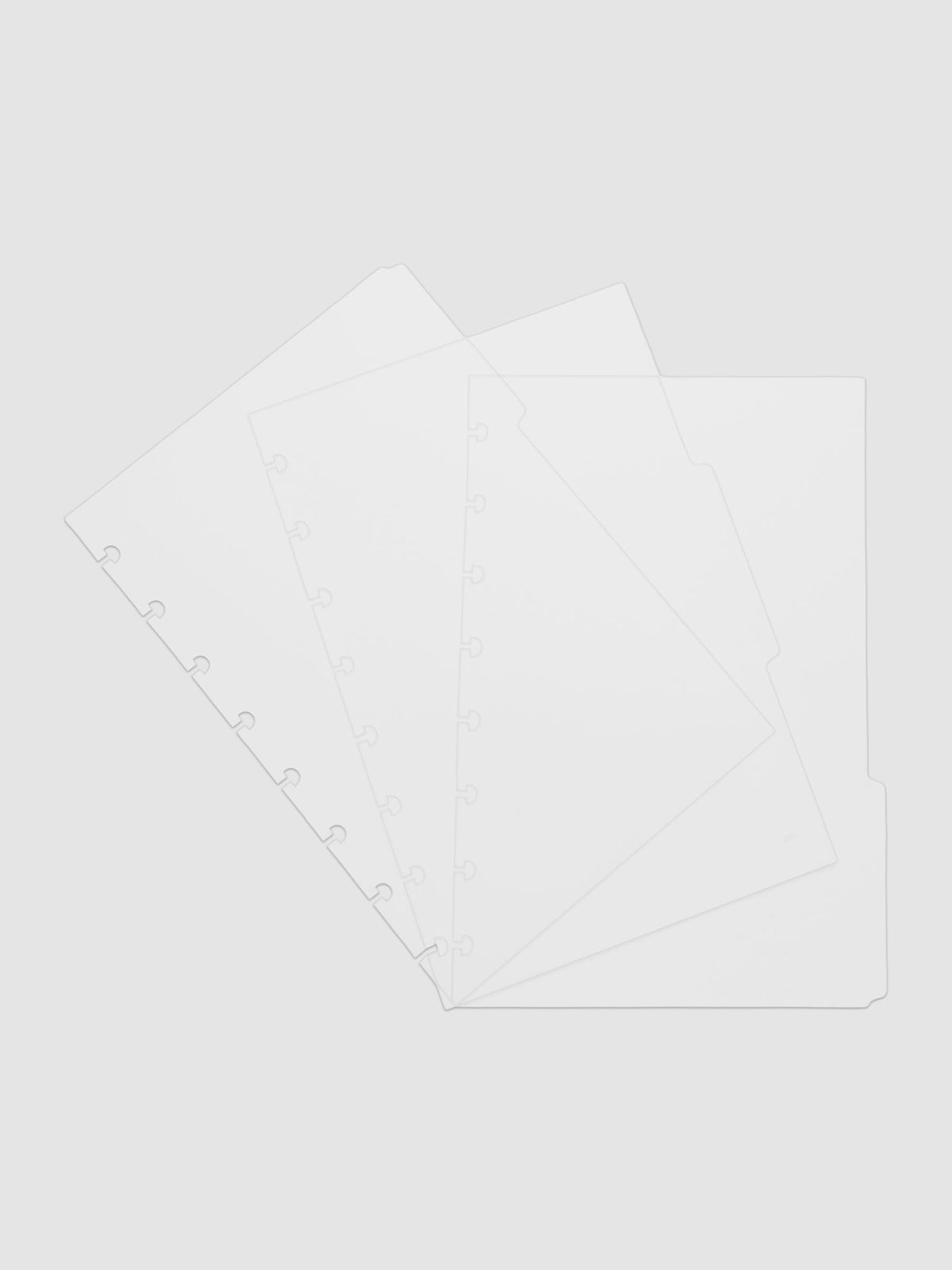 Three 8-disc punch clear side tab dividers sized for Half Letter planners.