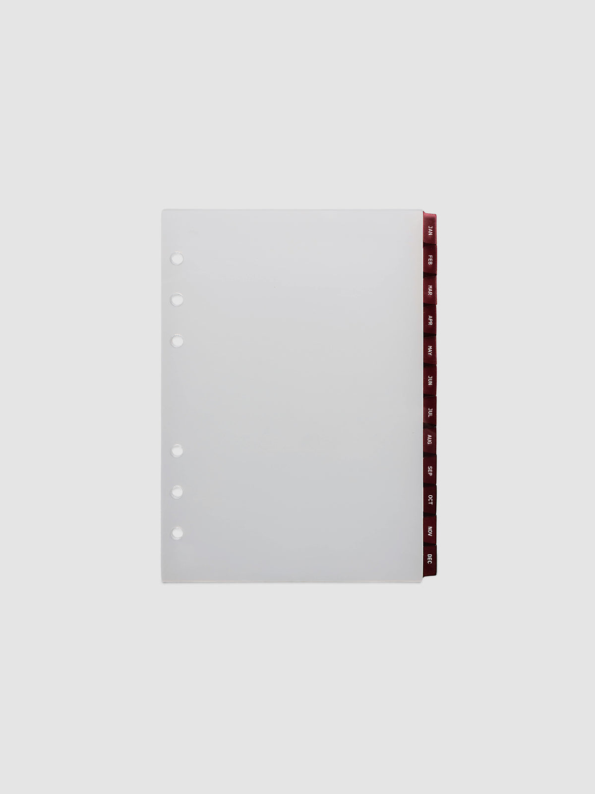 Personal Wide 6-Ring Punch Ultra-Thin Monthly Dividers in deep red, set of 12 dividers fanned to show all months