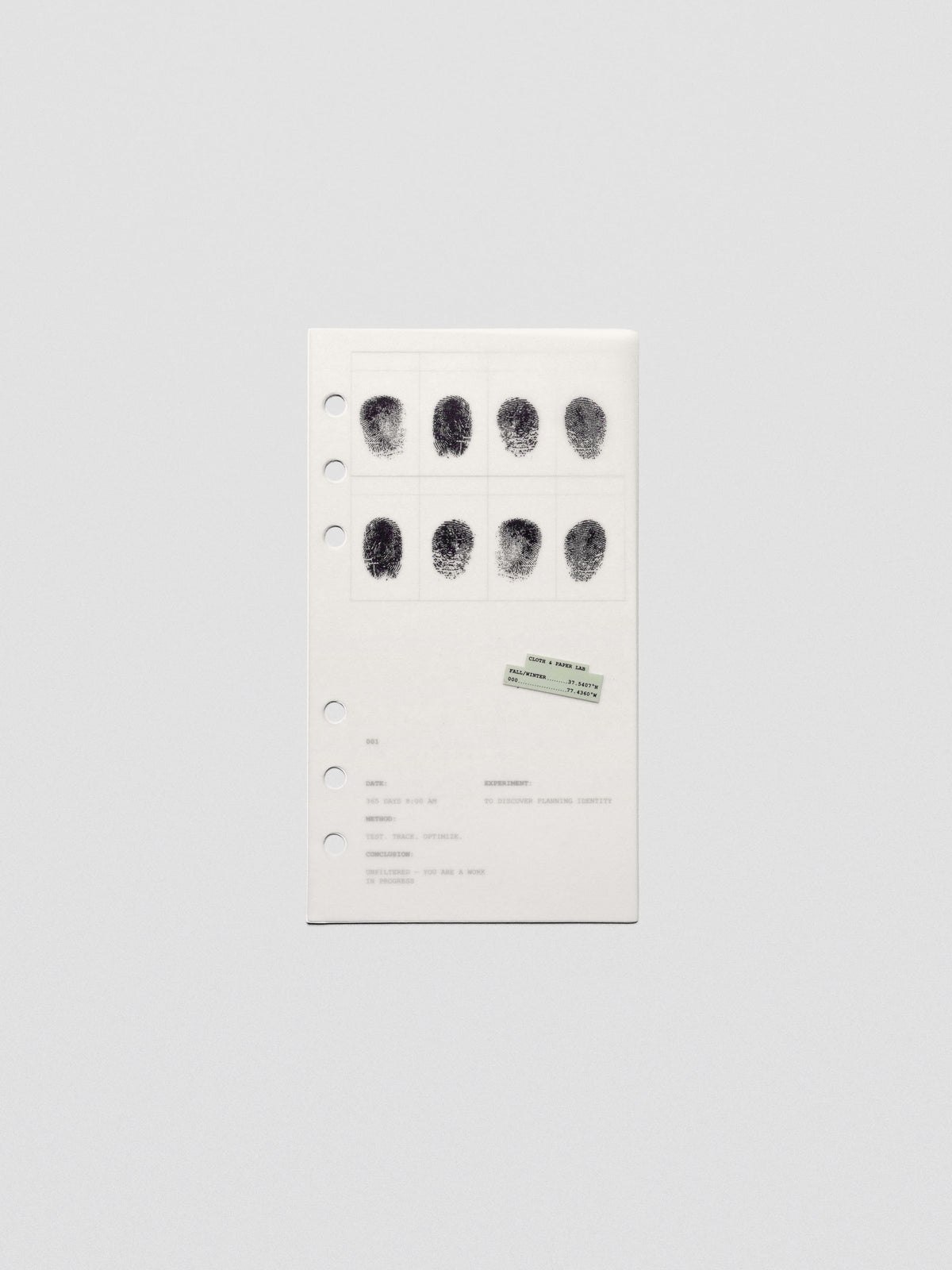 Two layered Personal sized planner dashboards, one semi-transparent, one matte, featuring a fingerprint design.