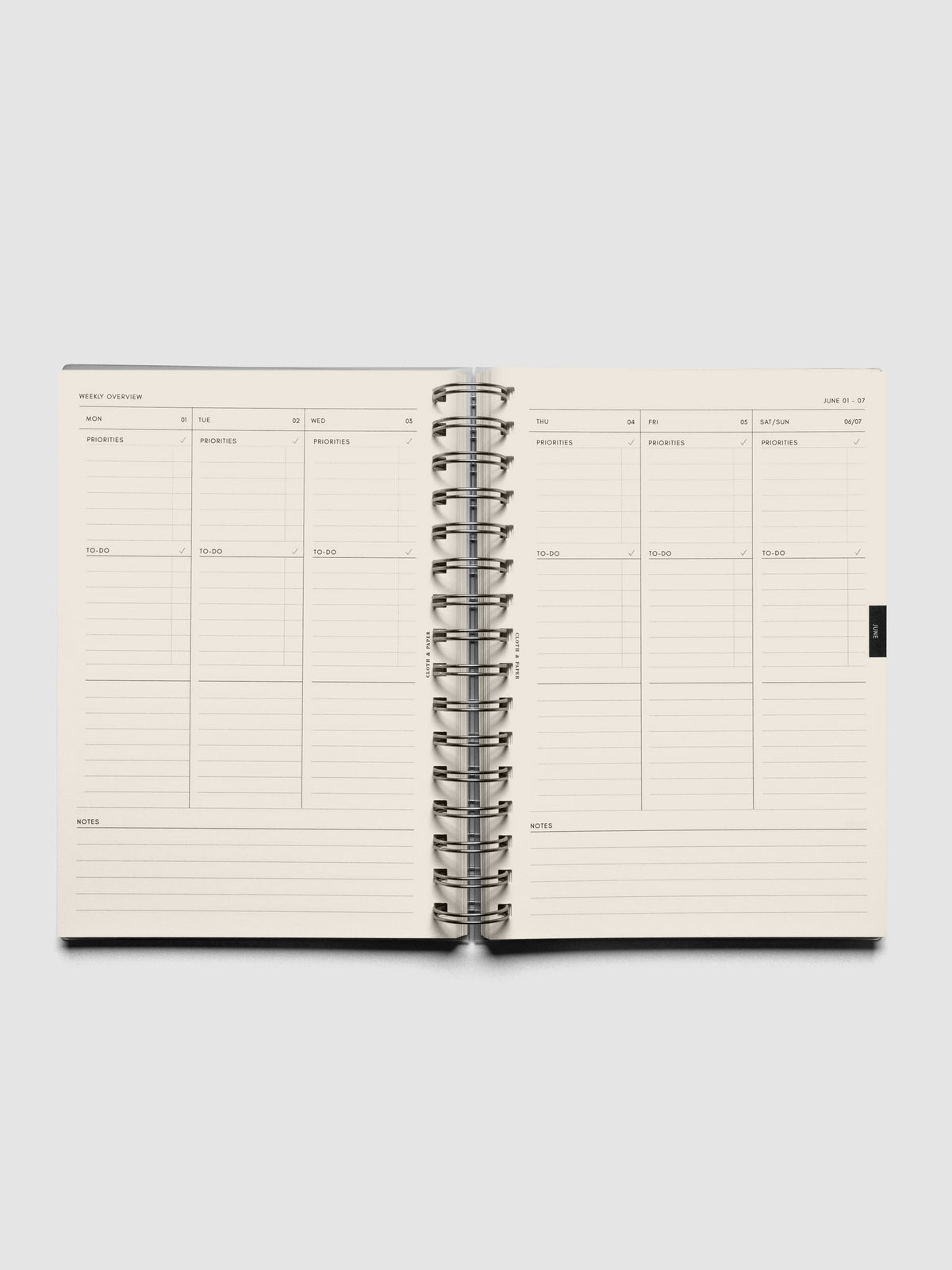 2026 Weekly Task Notebook shown open to a weekly spread with sections for every day in task layout with extra space for notes below.