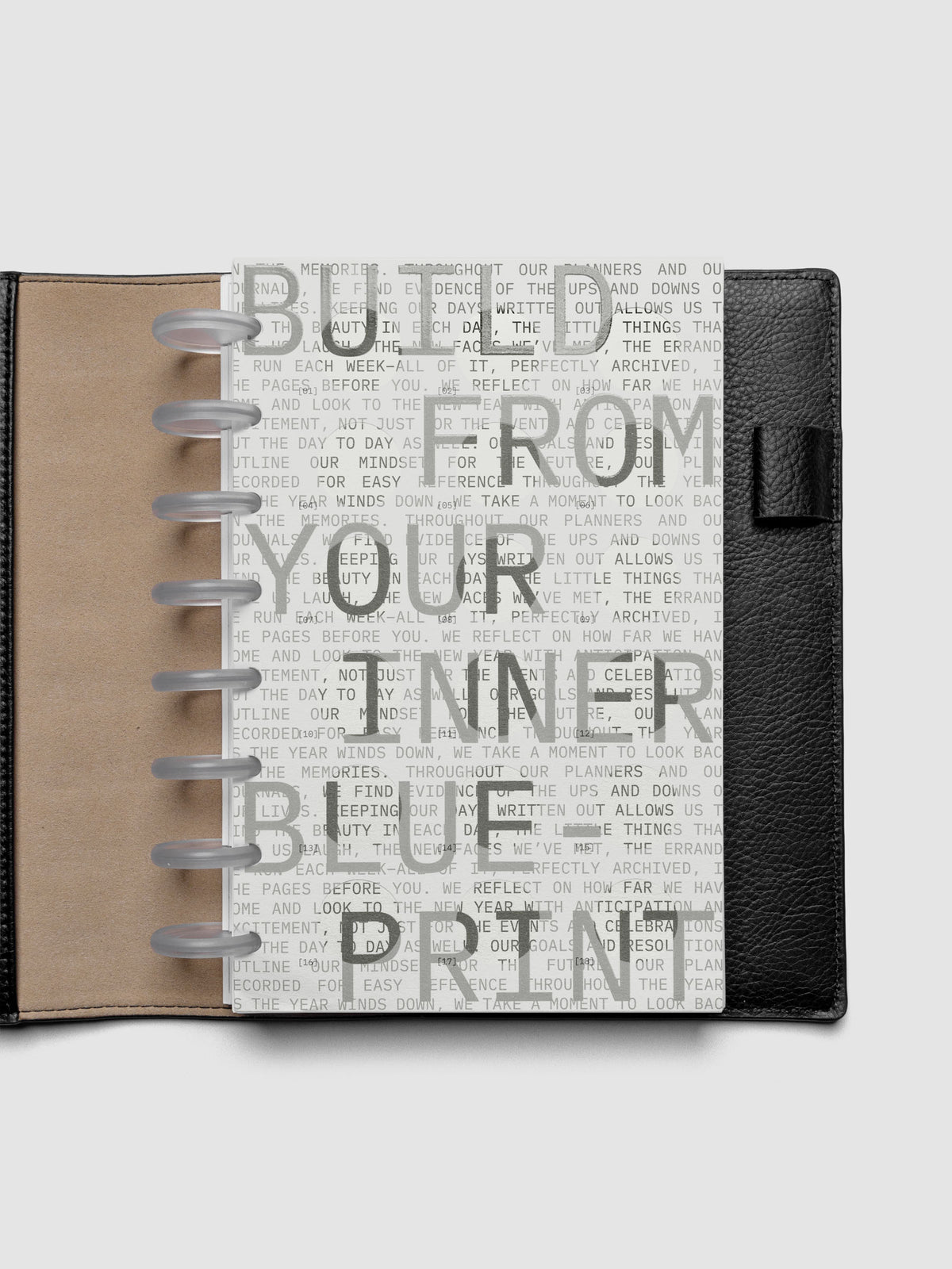 Inner Blueprint Dashboard Duo shown ring bound in a black leather folio in size Half Letter.
