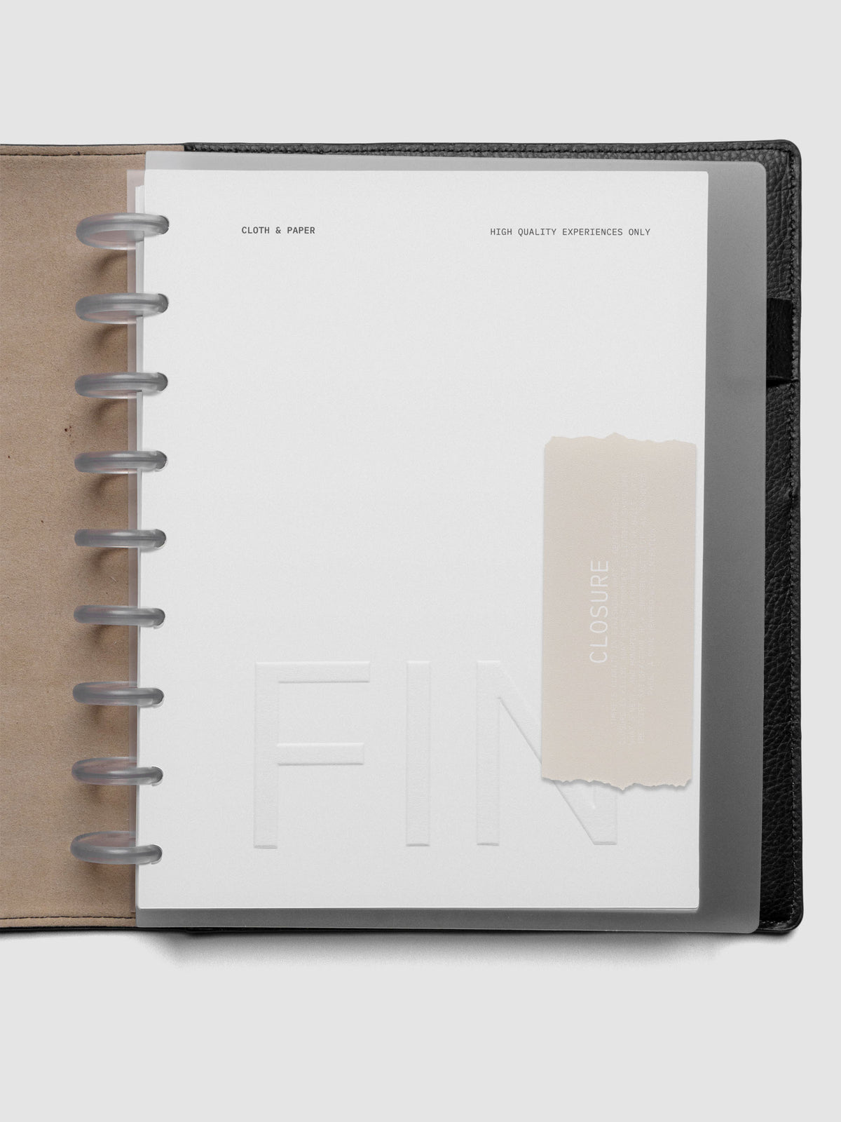 Closure Planner Dashboard + Cover Set in size HP Classic shown discbound in a black leather folio cover.