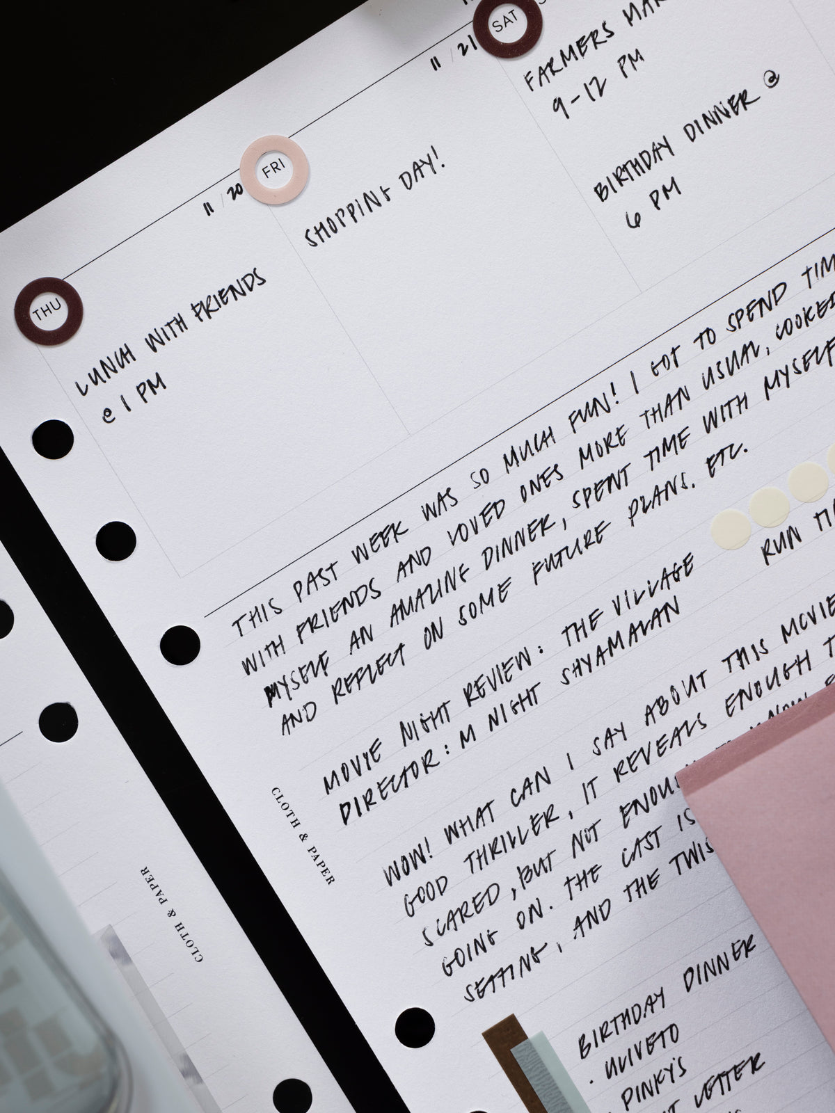 A filled in planner insert with Spotlight Stickers | High Gloss applied to the days of the week for emphasis.
