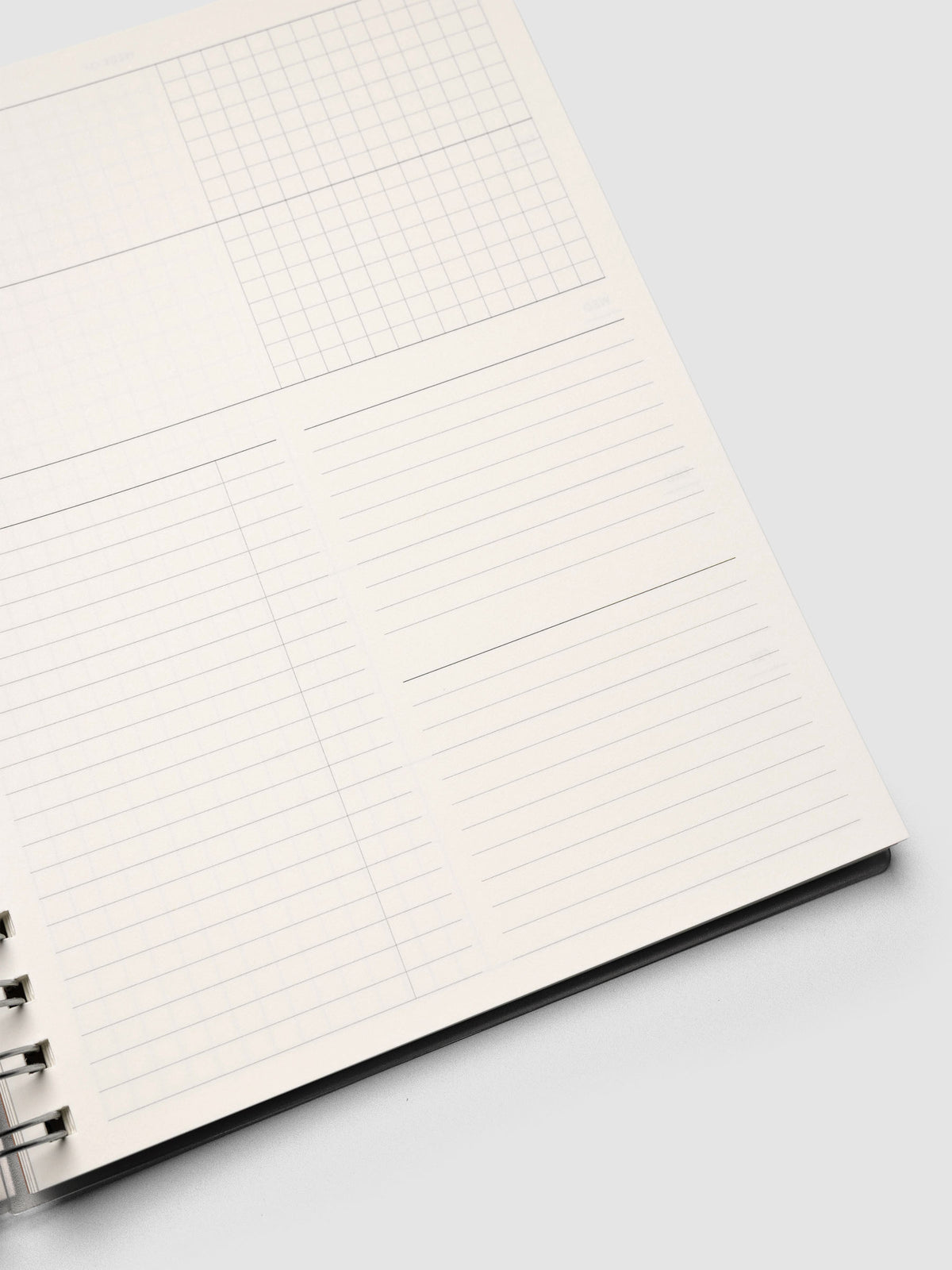 Spiral Notebook in size HP Classic and color Moscow (orange) shown open displaying Weekly Horizontal interior layout with sections for tasks and memos.