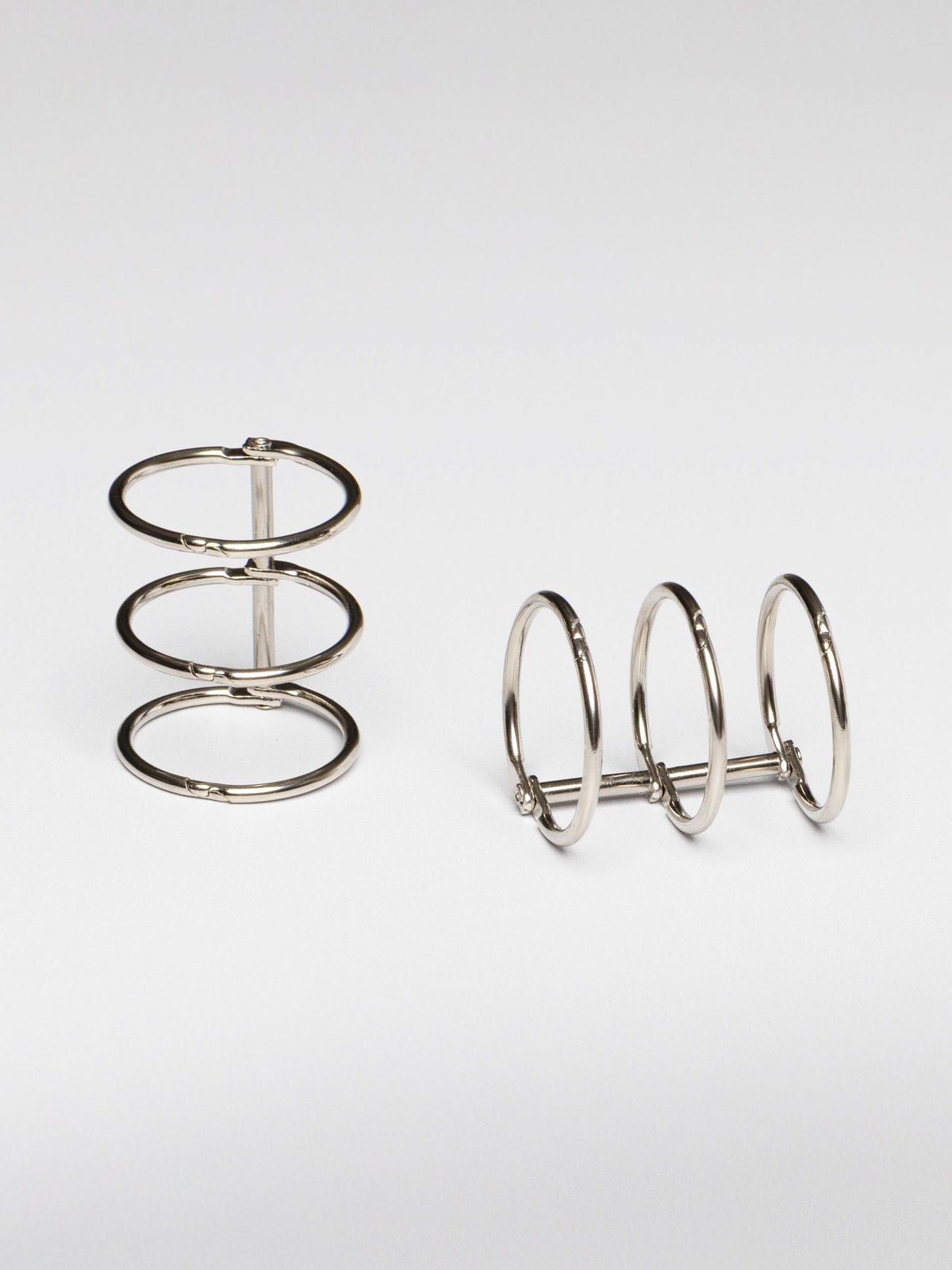 Planner rings displayed on a neutral background. Color shown is silver.
