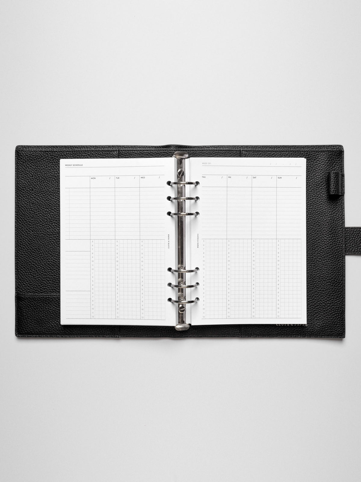 A5 insert in use inside a leather planner.