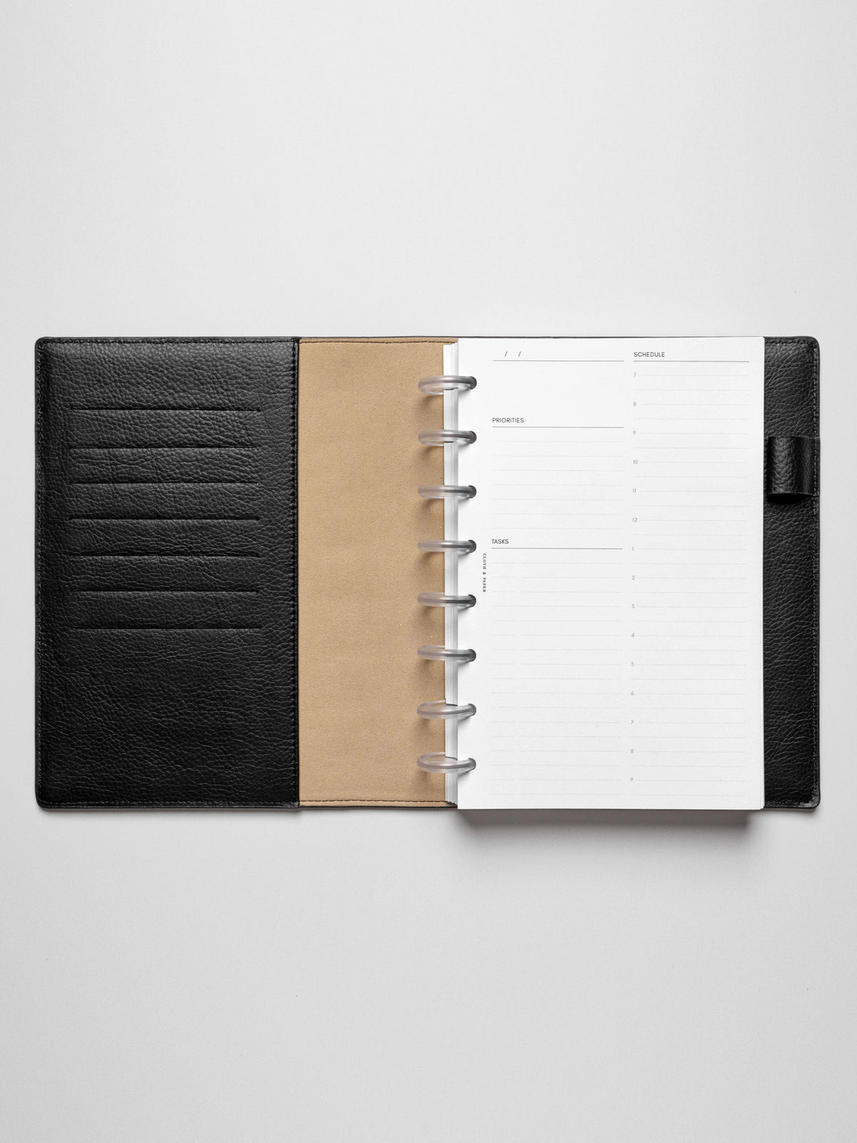 Half Letter insert in use inside a leather planner.
