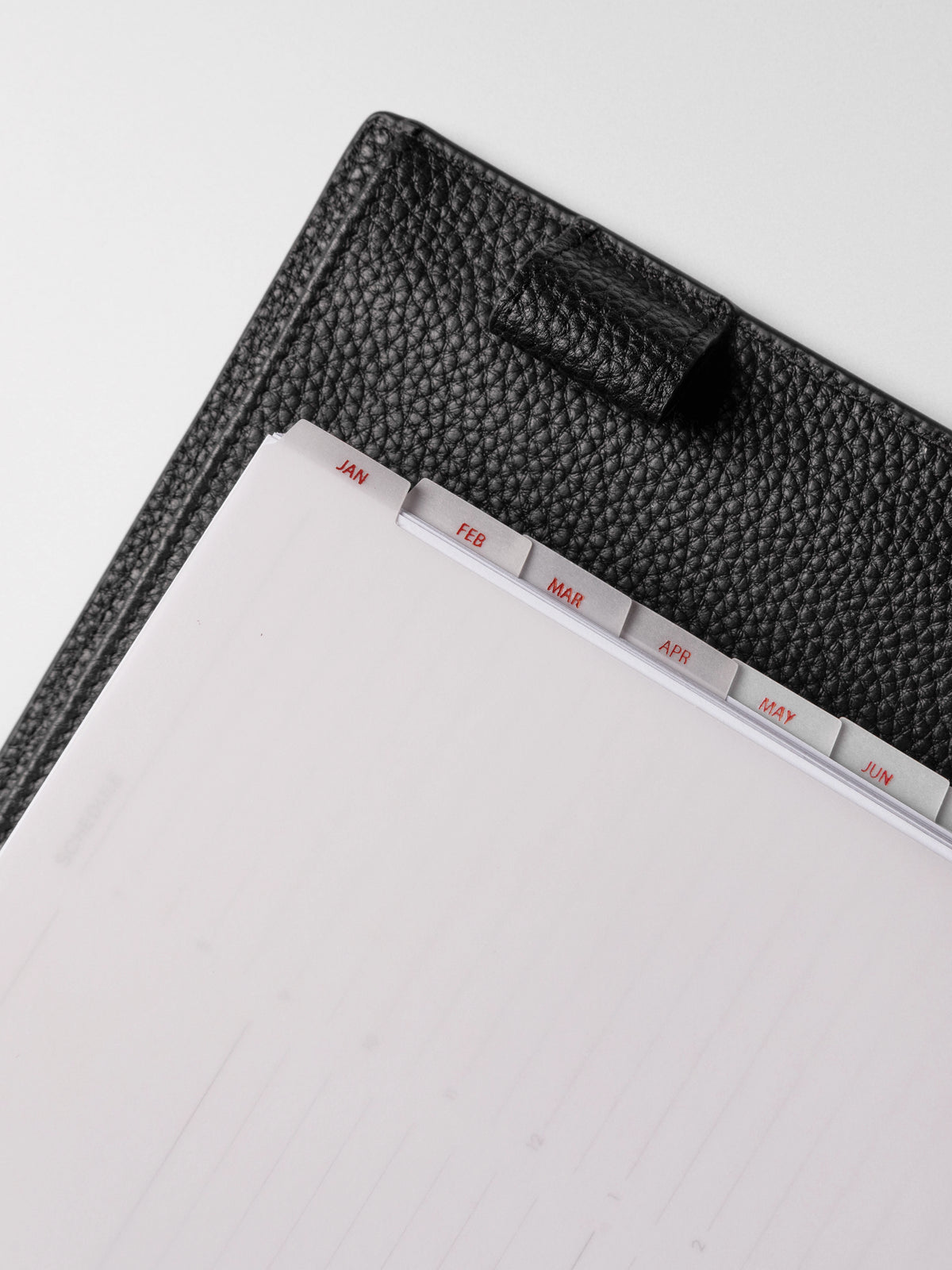 Closeup of A5 vellum dividers shown on a neutral background.