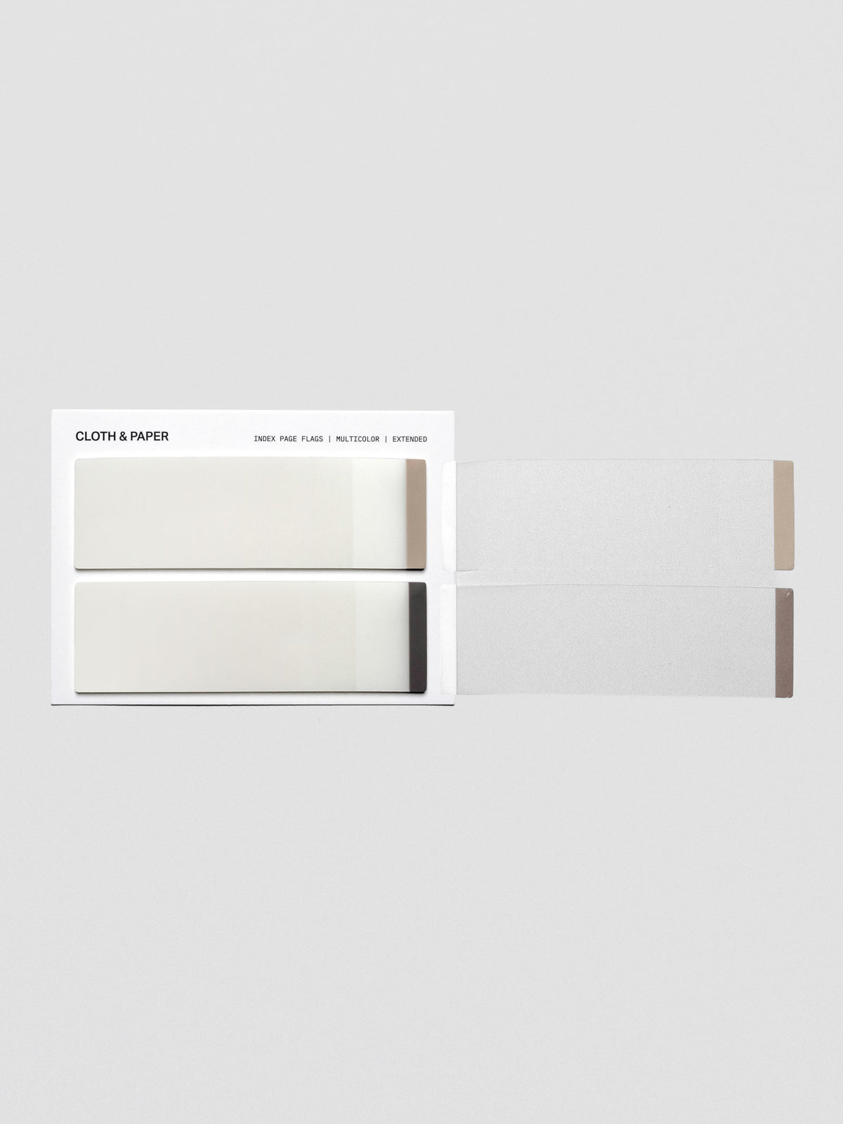 A multicolor pack of extended transparent page flags with colored tips in light and dark brown. Shown with two individual page flags adhered to the background to demonstrate transparency.