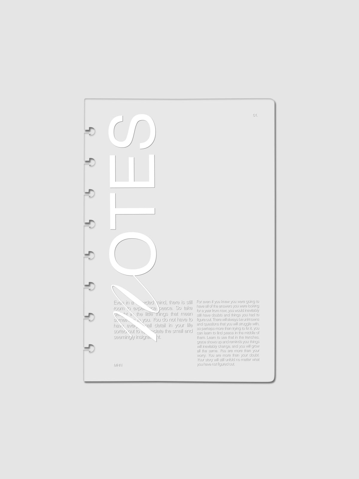 Clear plastic planner cover with white printed text shown pre-punched for Half Letter discbound planners.