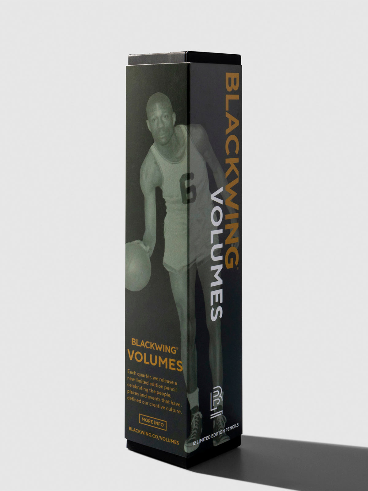 Pencil packaging displayed on a neutral background. It features a grayscale photo of Bill Russel in his basketball uniform, dribbling a basketball.
