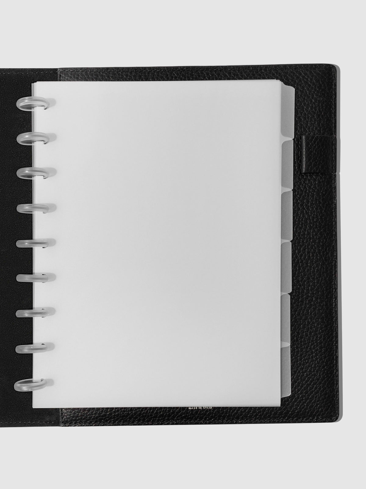 HP Classic Blank side tabs shown in use inside a black leather planner.