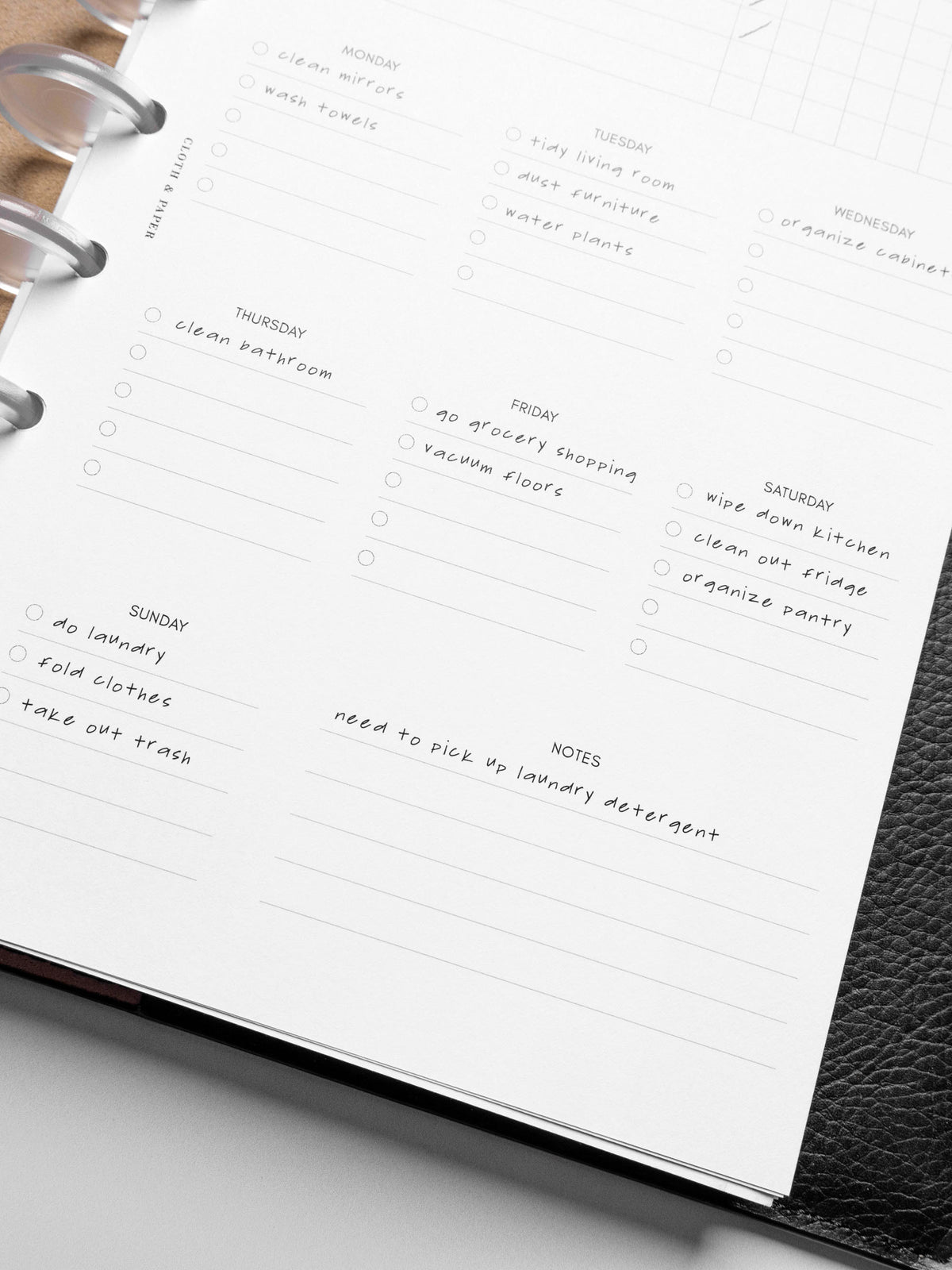 Insert in use inside a black leather planner.
