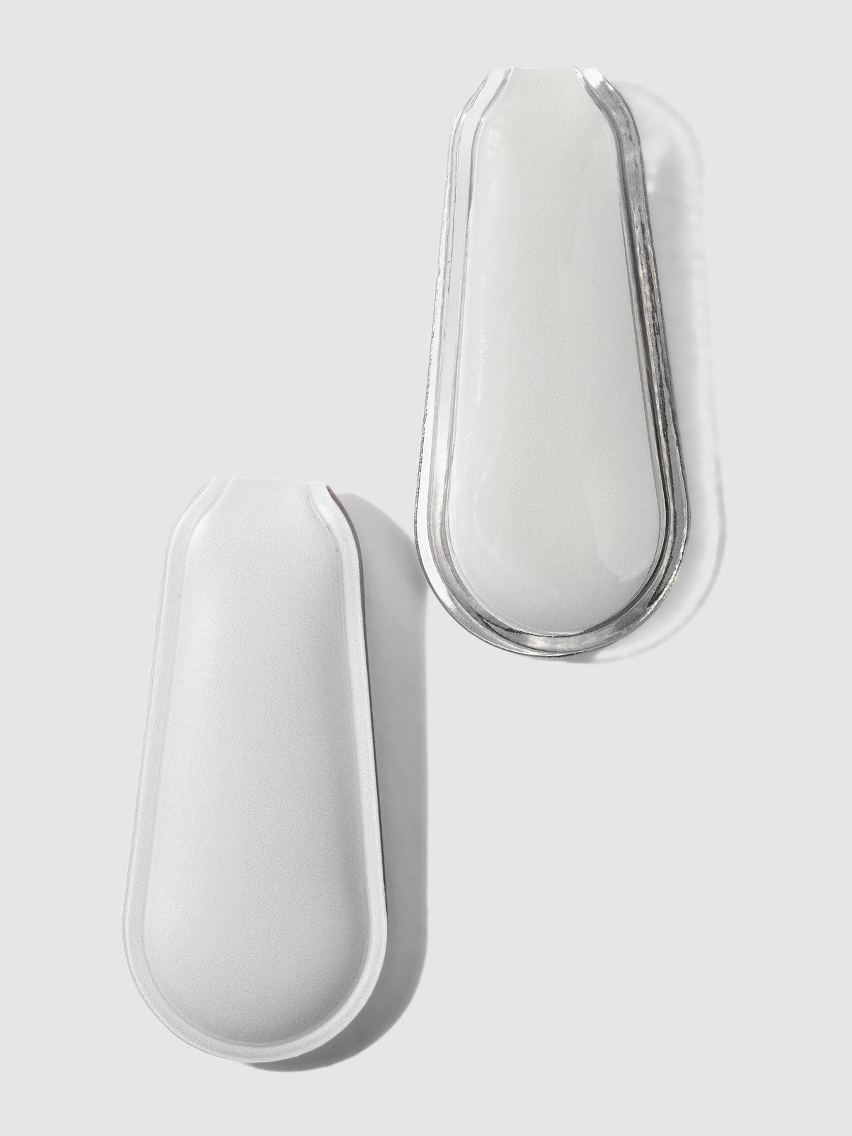 Matte and Glossy Leche Cloth and Paperclip displayed on a neutral background.