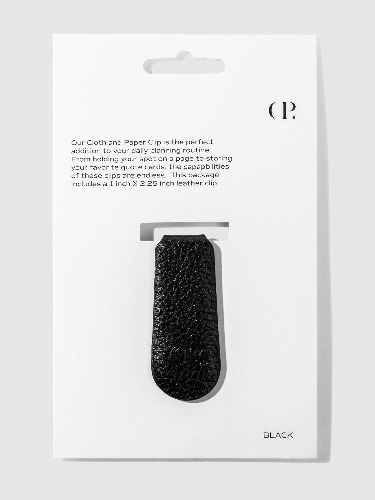Cloth and Paperclip, Smooth Leather, Cloth and Paper. Clip in its packaging displayed on a neutral background. Color shown is black.