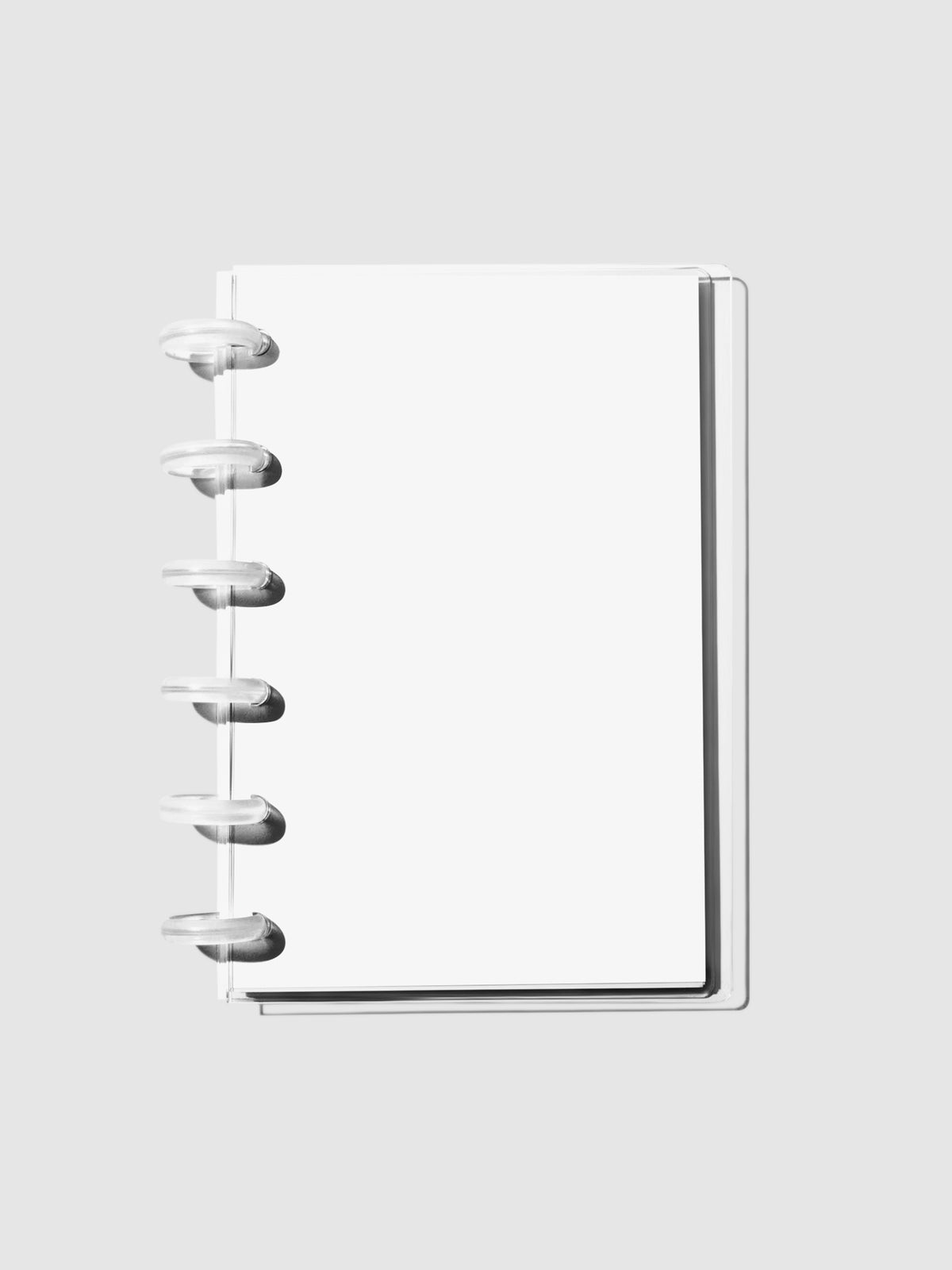 Crystal Clear Discbound Notebook Cover in use with clear rings.