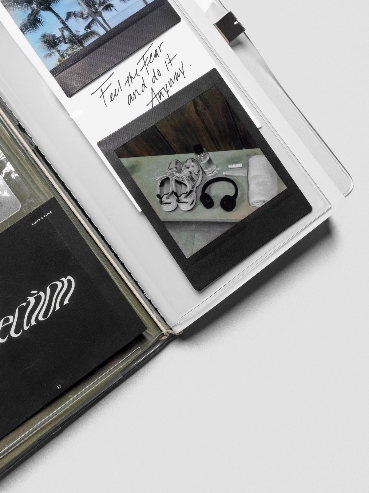 A5 Slim Traveler’s Notebook with clear document pocket inserted along center cord.