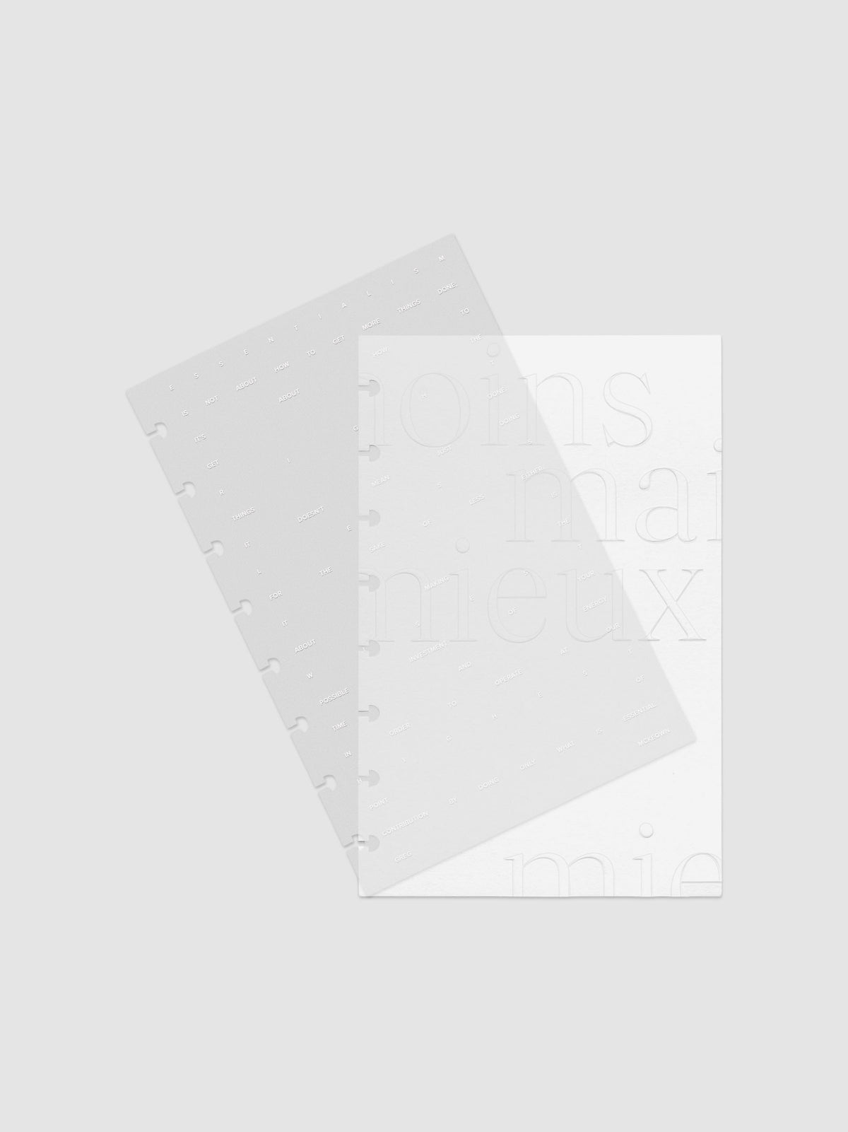 Essentialism Dashboard Duo reading "moins mai mieux" in size Half Letter; shown with layers offset.