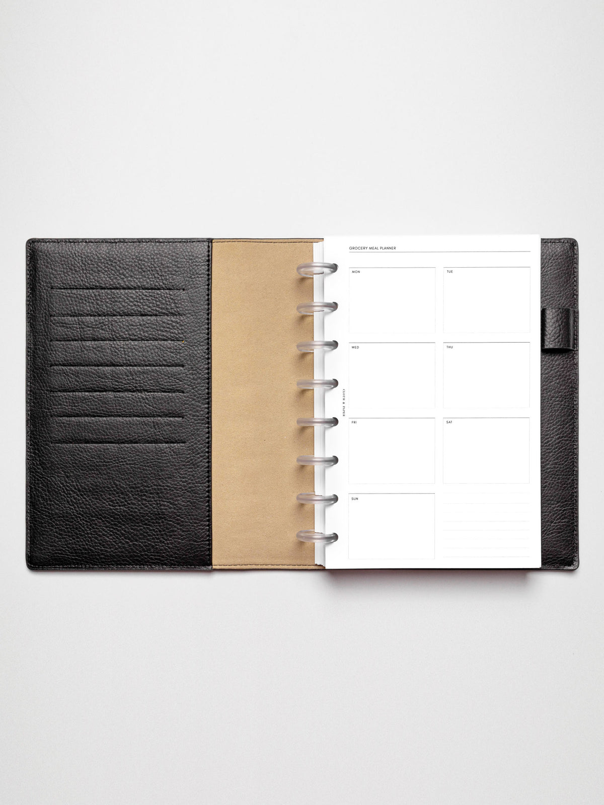 Grocery Meal Planner Insert inside an opened planner.