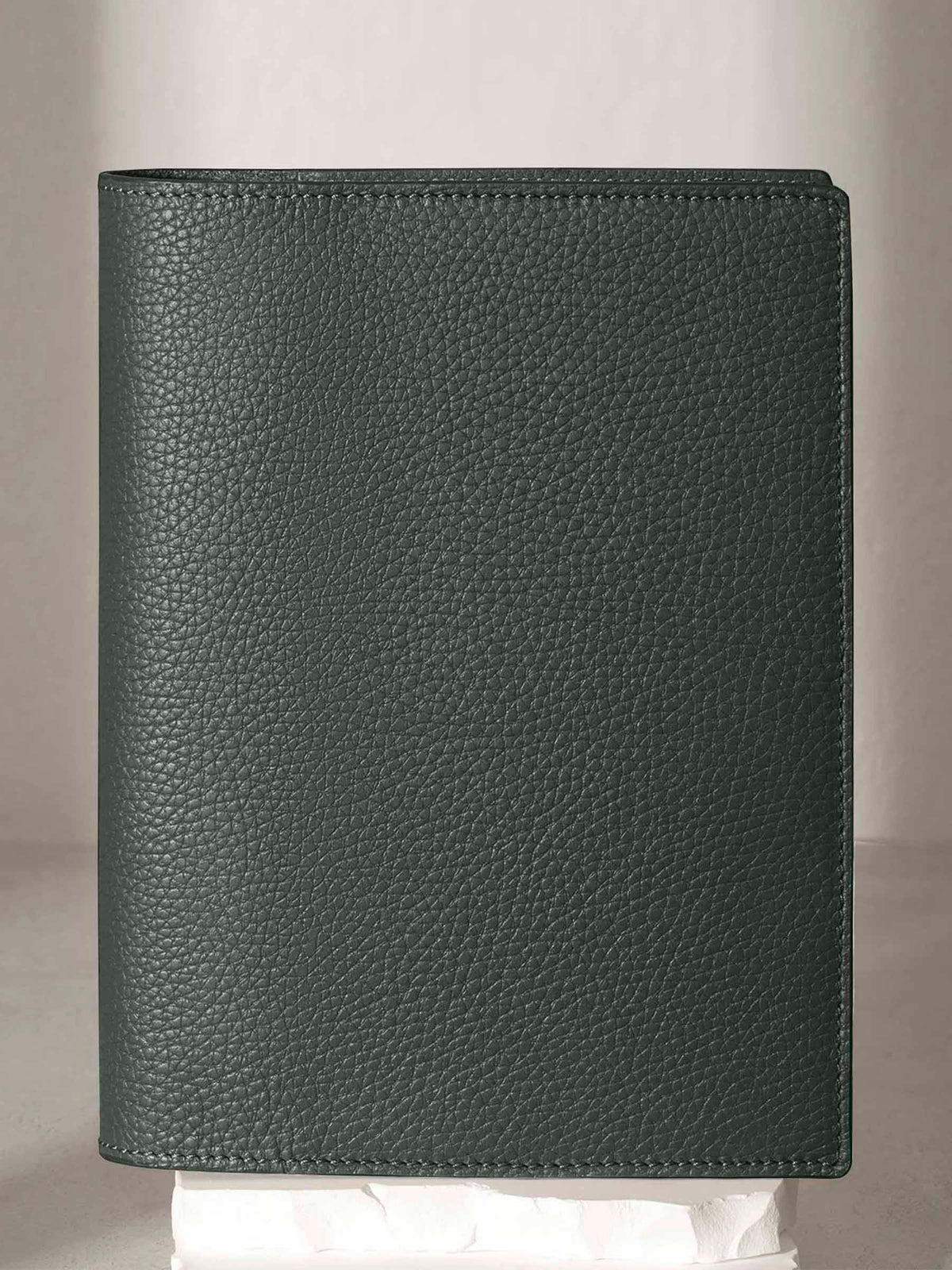 Large folio displayed on a neutral background.