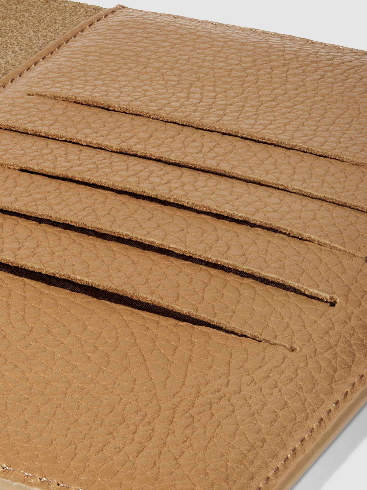 Closeup of Catalonia folio showing the hand-cut credit card slots.