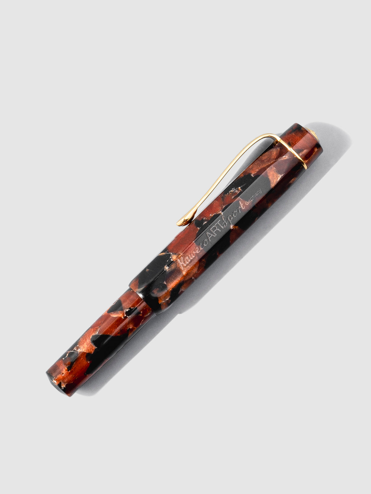 Pen shown capped on a neutral background.