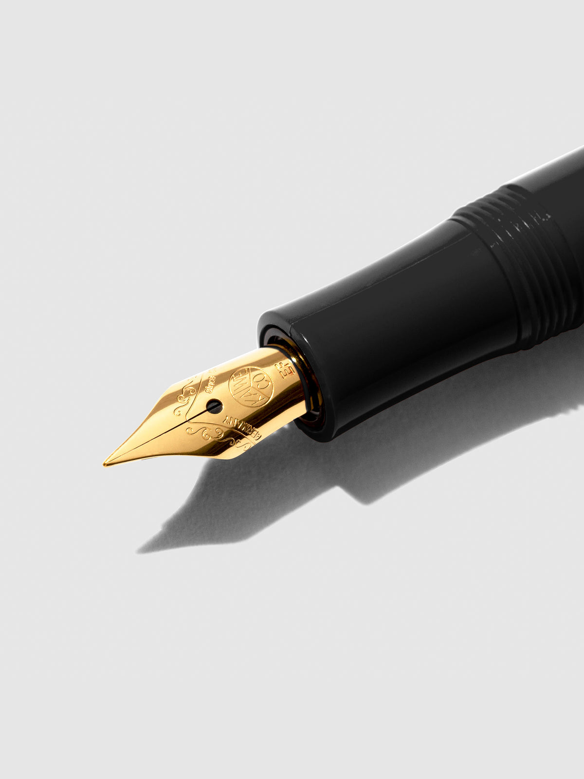 Closeup of nib on black pen.
