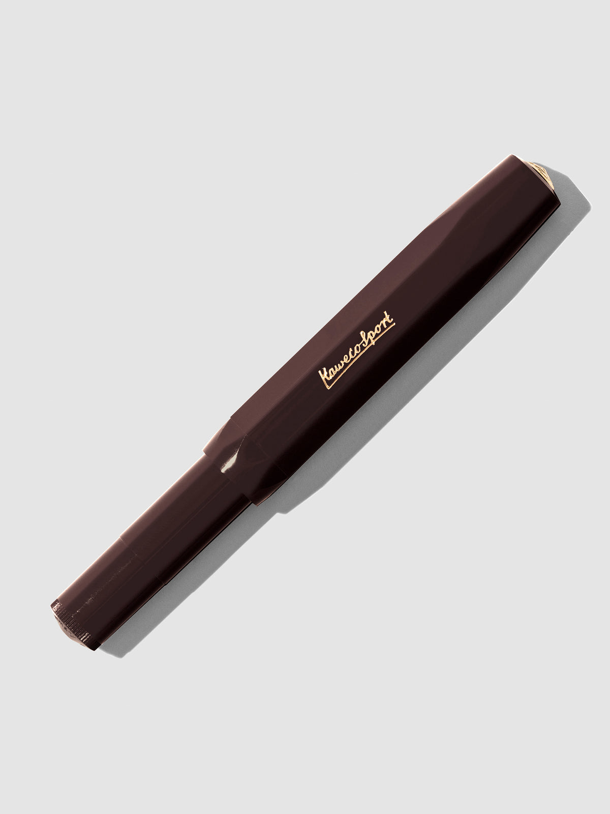 Burgundy Extra Fine Nib pen displayed with cap on a neutral background.