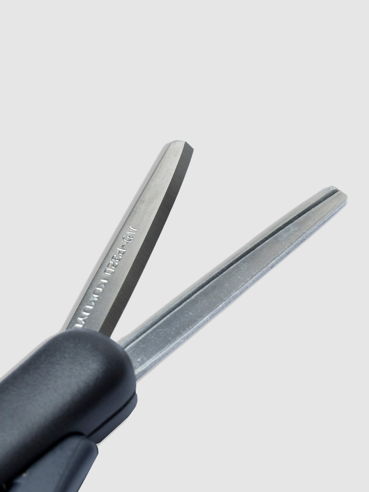 Close up on blades of Black scissors.