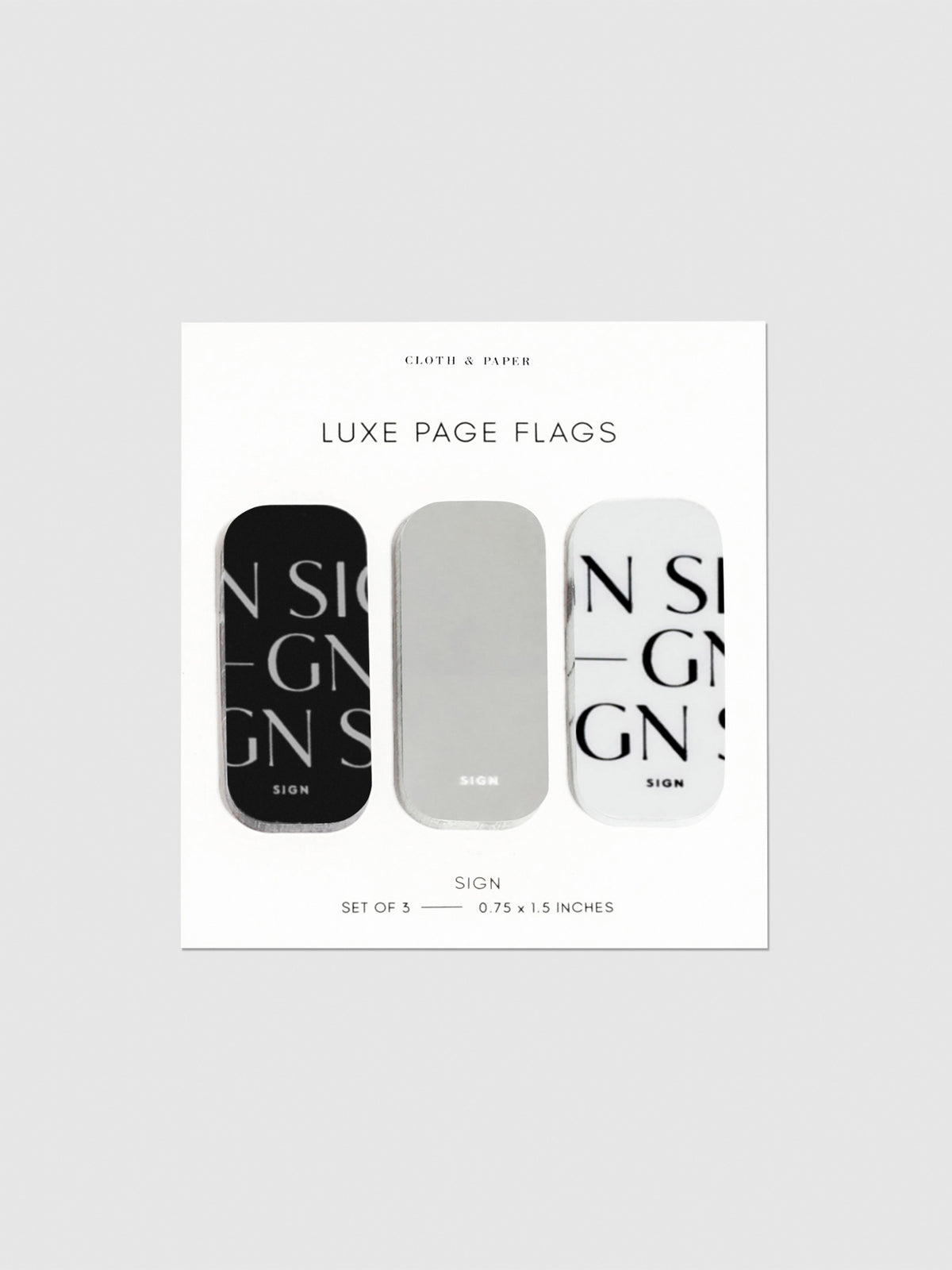 Luxe page flags on their backing on a neutral background. The text on the left and right flag read "Sign" repeated multiple times.