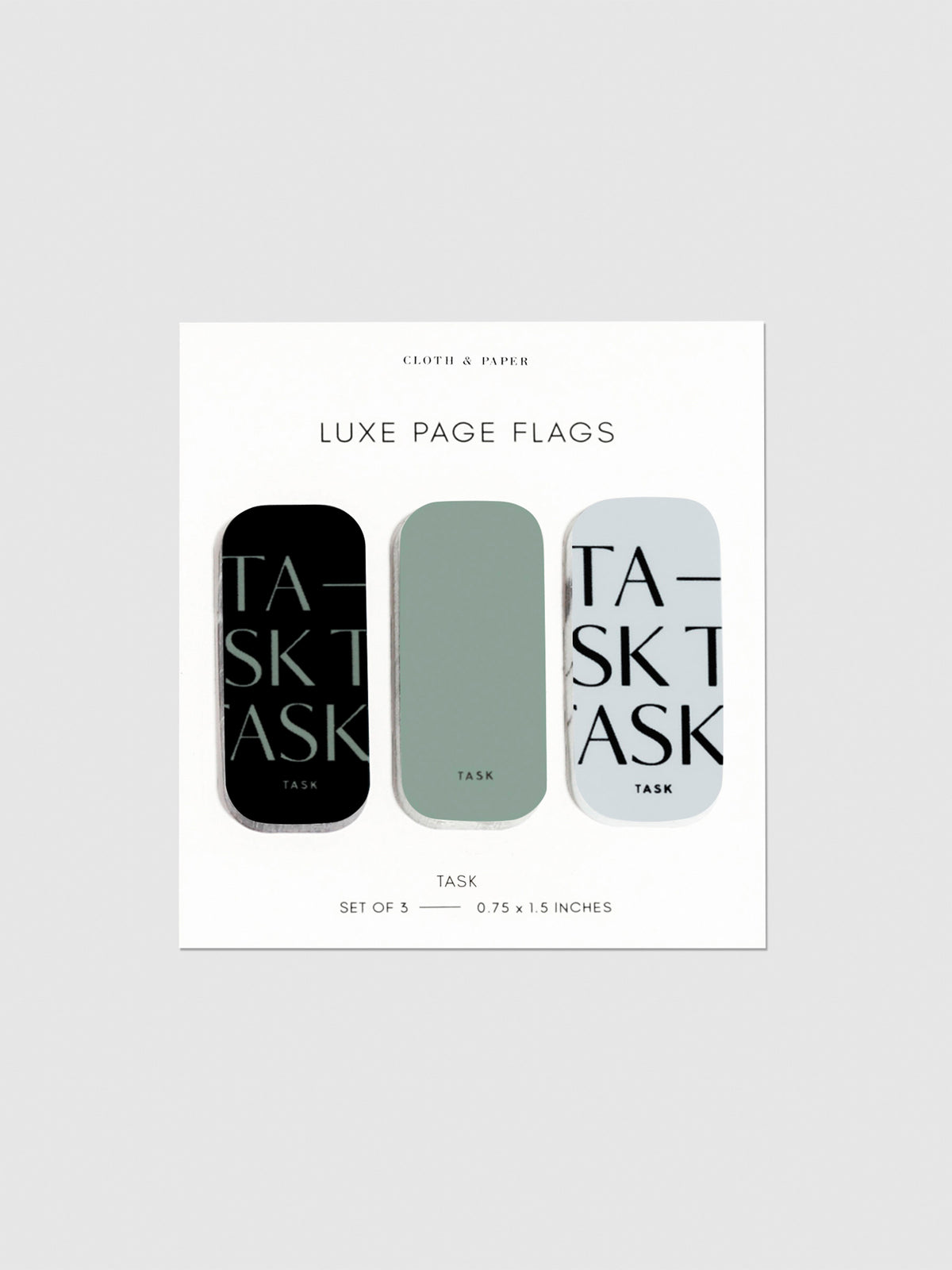 Luxe page flags on their backing on a neutral background. The text on the left and right flag read "Task" repeated multiple times.