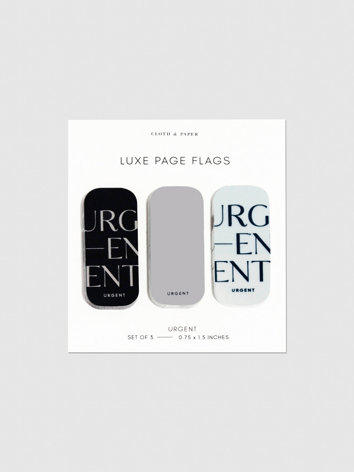 Luxe page flags on their backing on a neutral background. The text on the left and right flag read "Urgent" repeated multiple times.