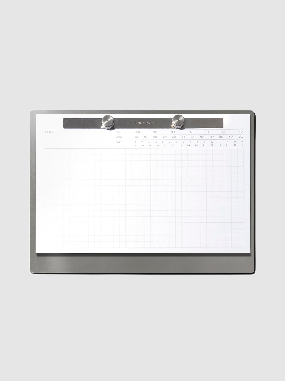 Modern Bound Notepad Insert Refills, executive notes, filled on the Modern Bound Notepad board, resting on a light gray background