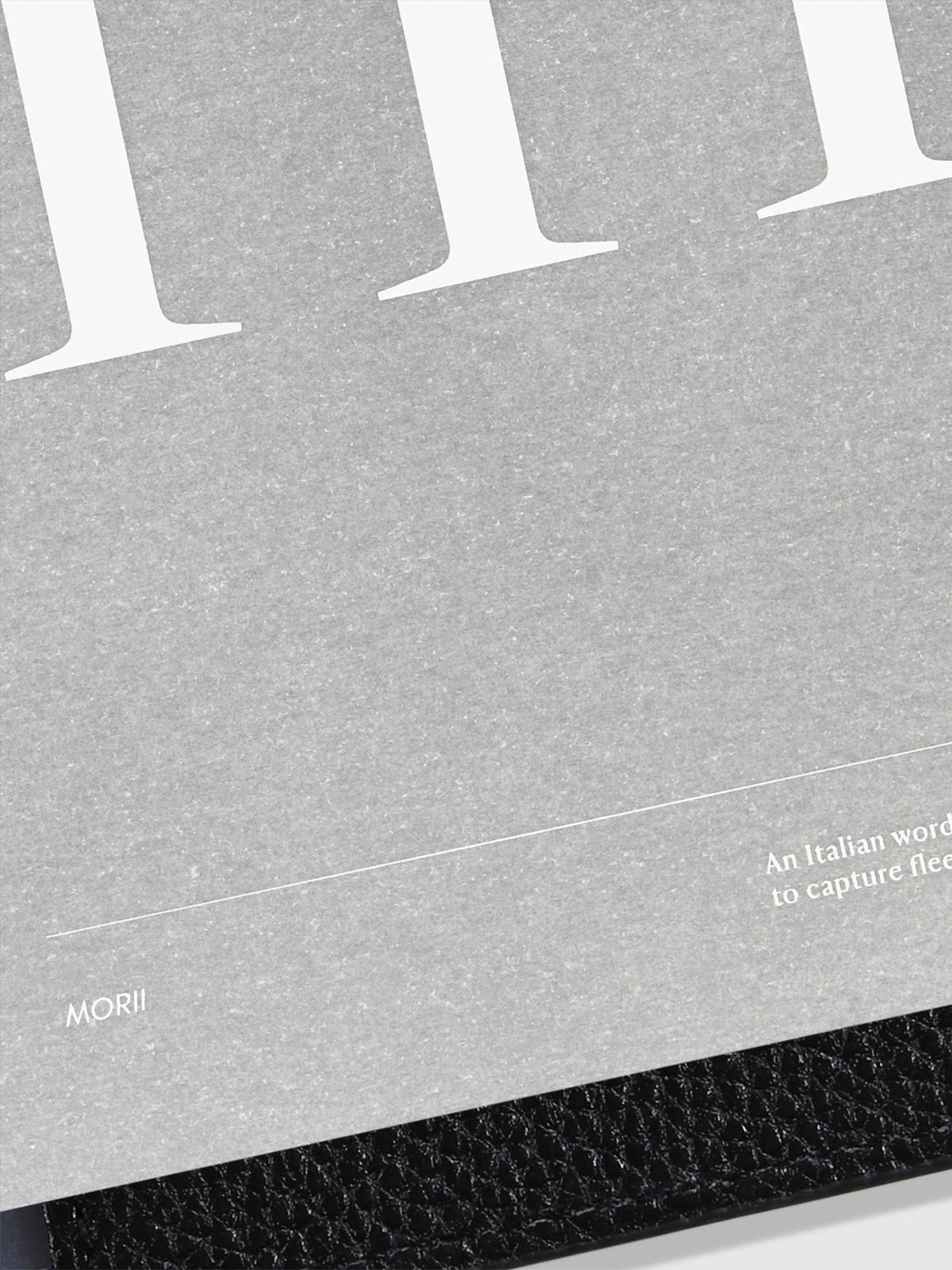 Monogram Vellum Planner Dashboard M in use in a leather planner.