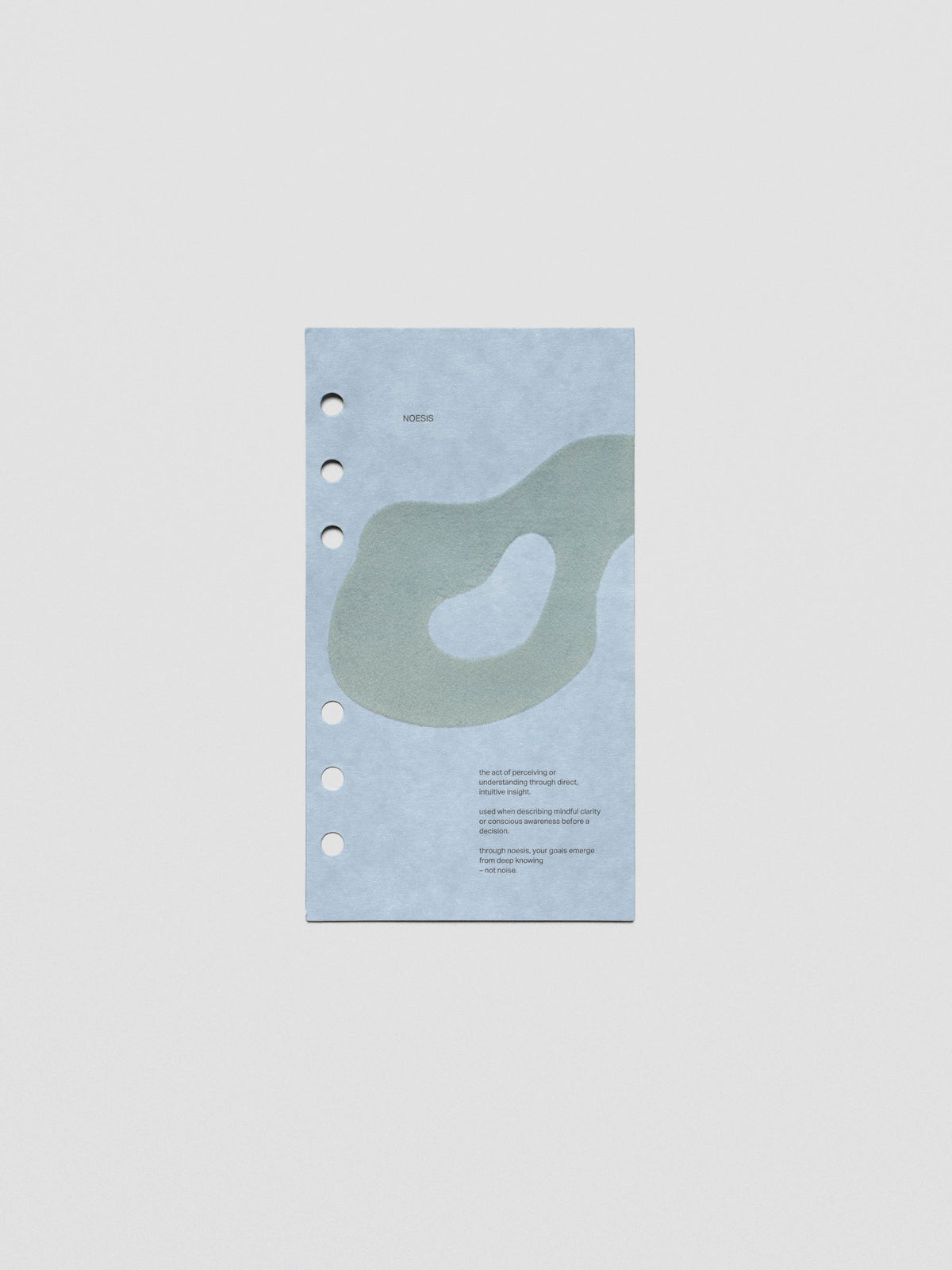 Blue speckle cardstock planner dashboard with organic shape design flocked in blue-green with text design shown in Personal size.