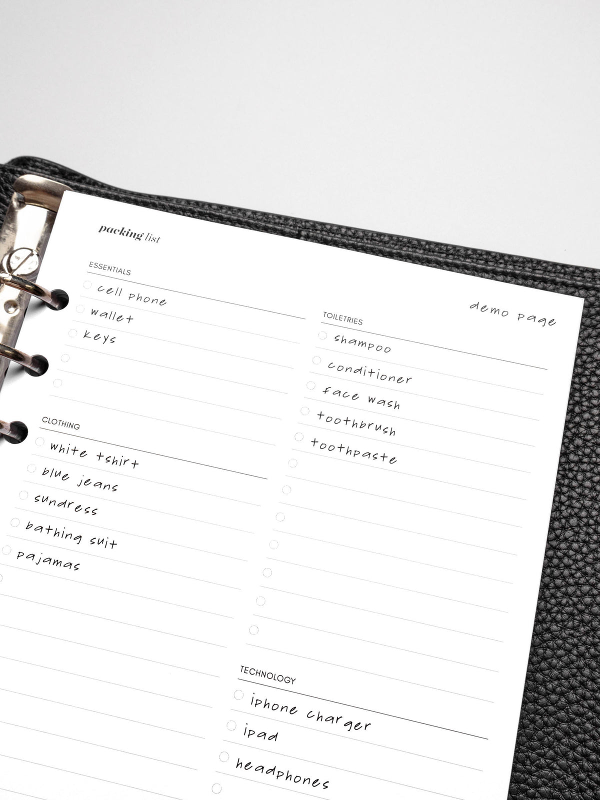 Insert in use inside a black leather planner.