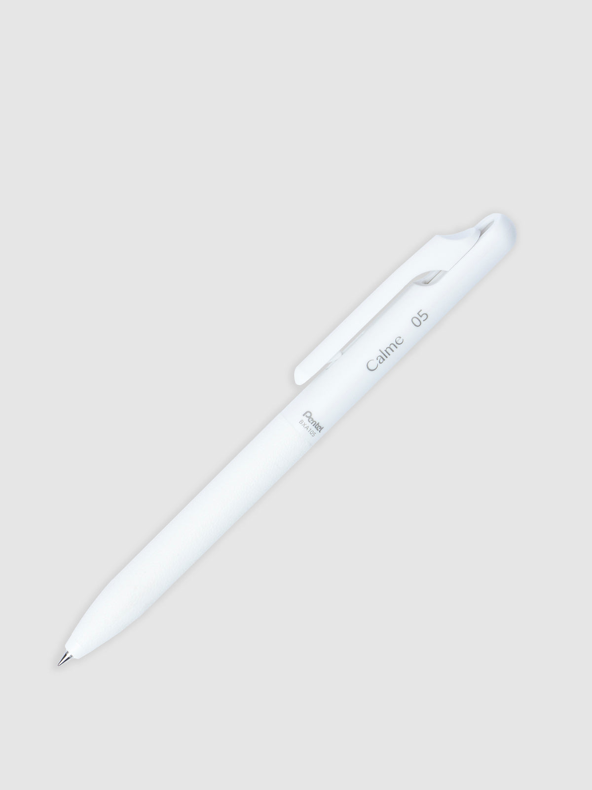 White pen turned to the right against a neutral background.