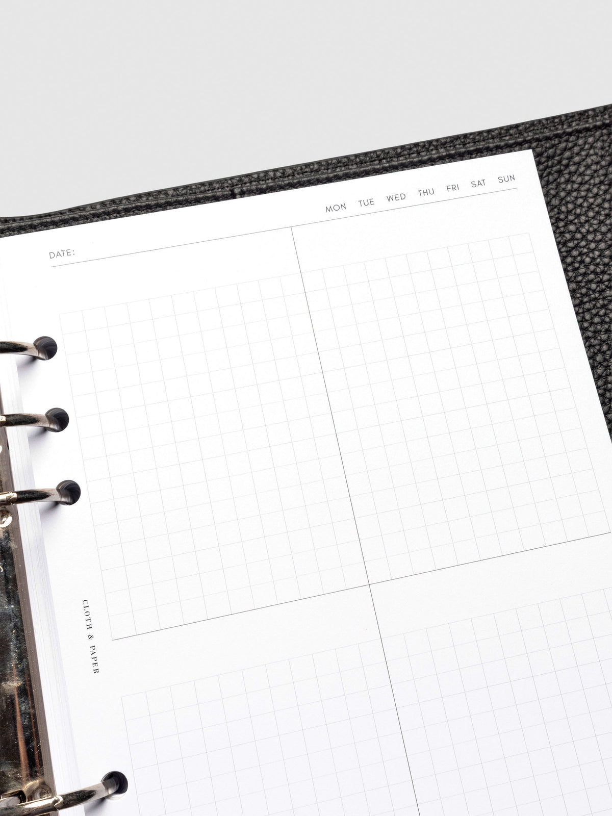 Insert in use inside a black leather planner.