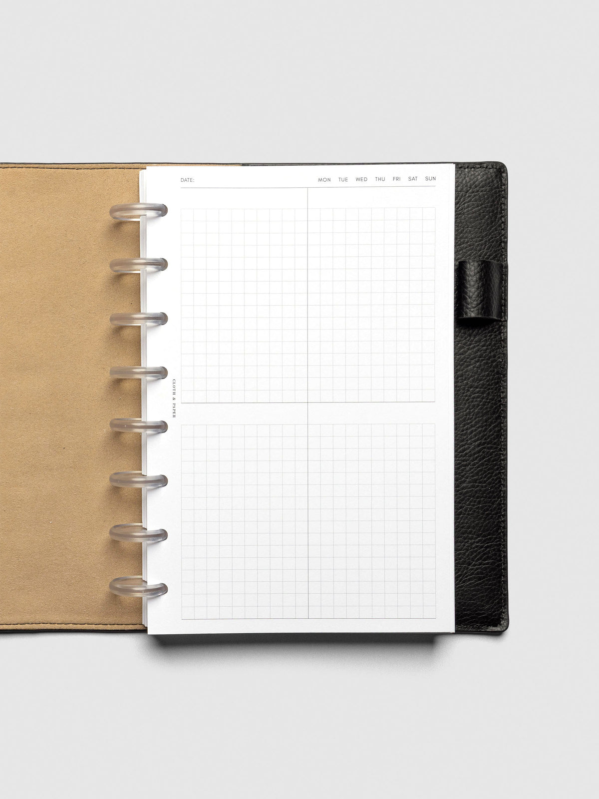 Insert in use inside a black leather planner.