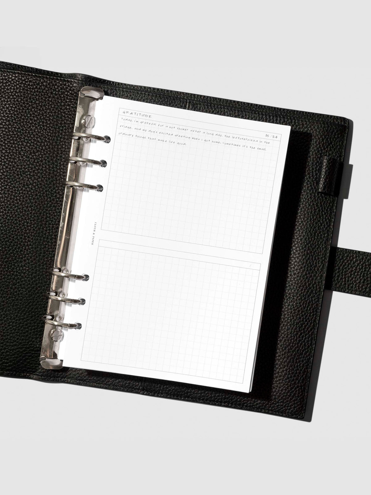 Insert in use inside a black leather
